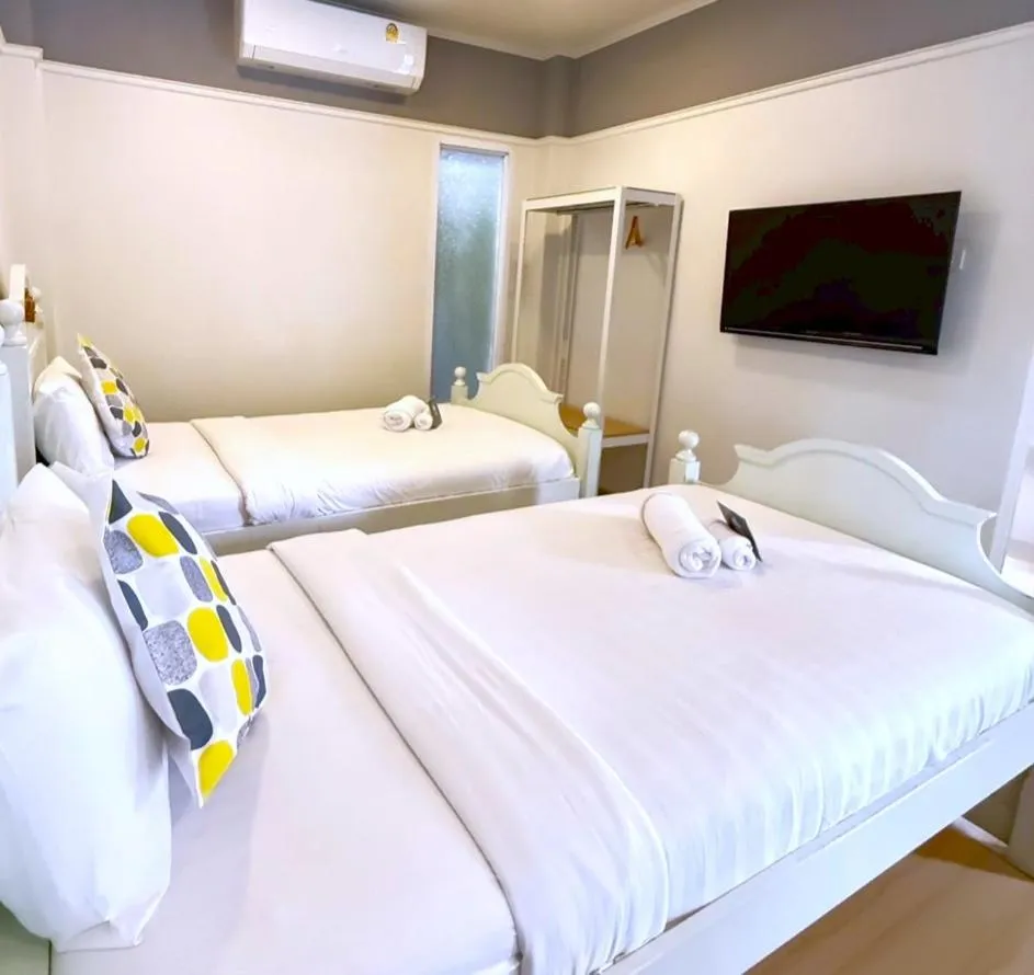 Bed in La Riva Boutique Hotel