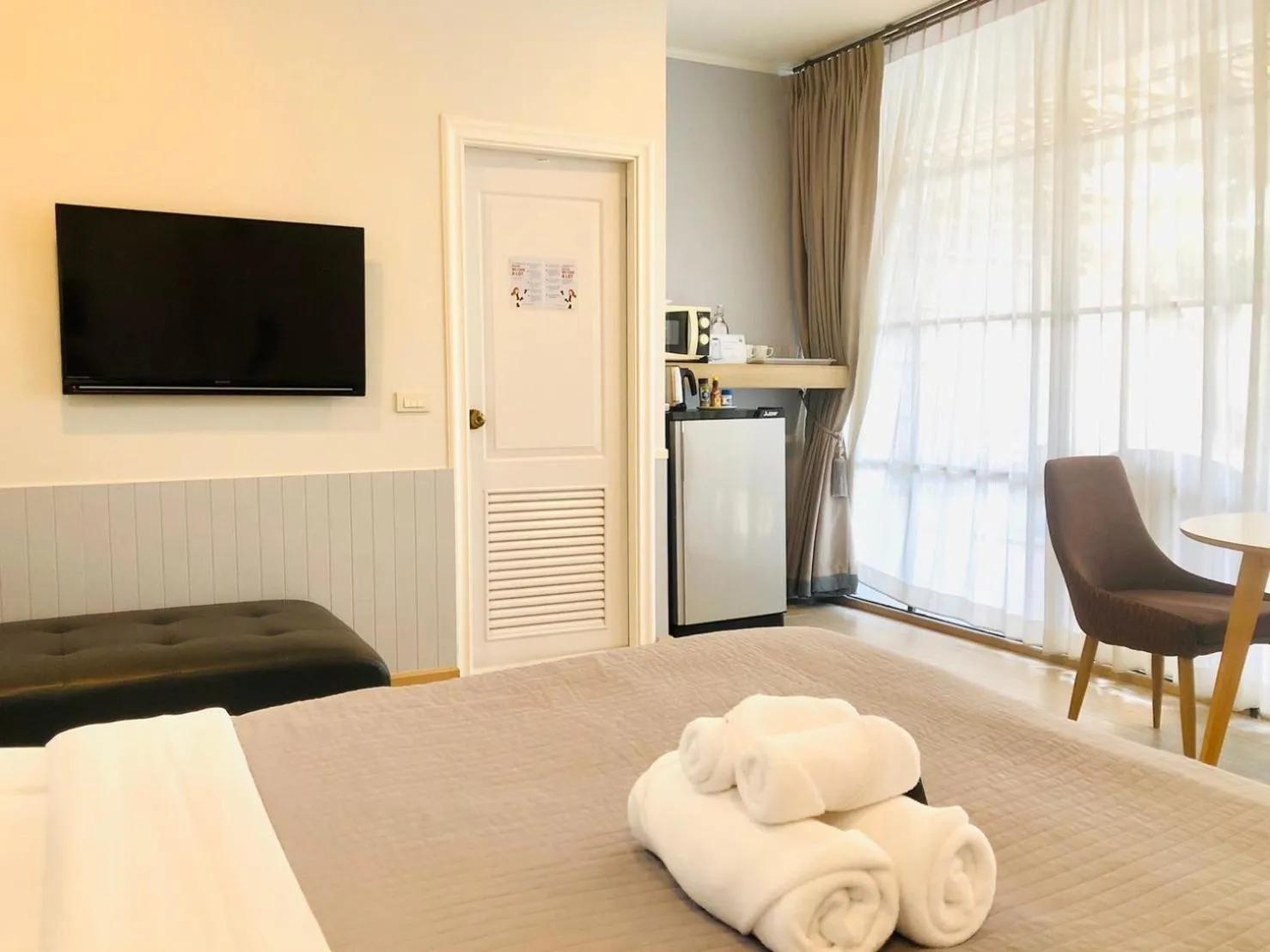 Bed in La Riva Boutique Hotel