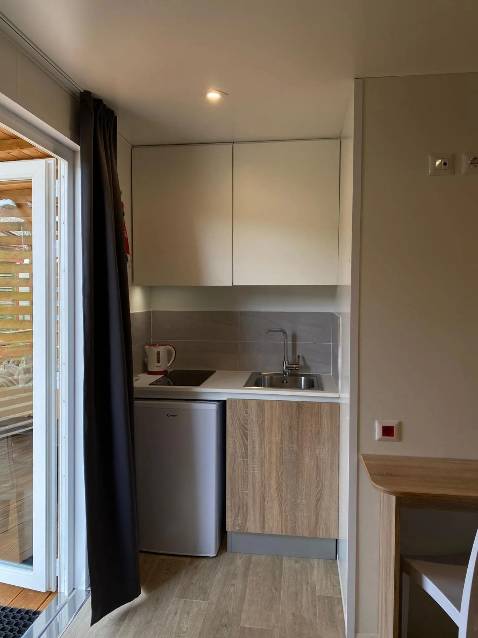 Kitchen or kitchenette in Camping Village Il Poggetto