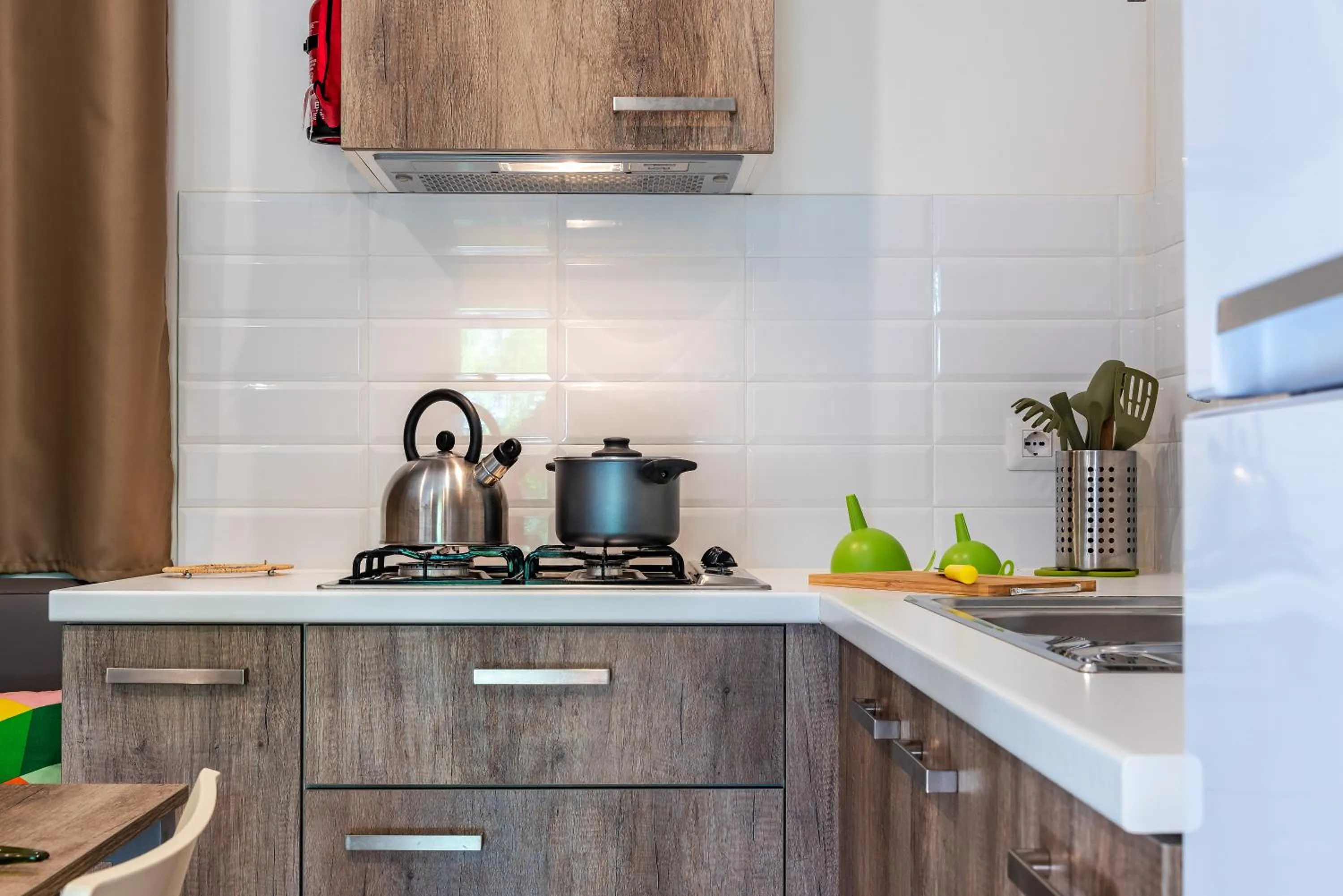 Kitchen or kitchenette in Camping Village Il Poggetto