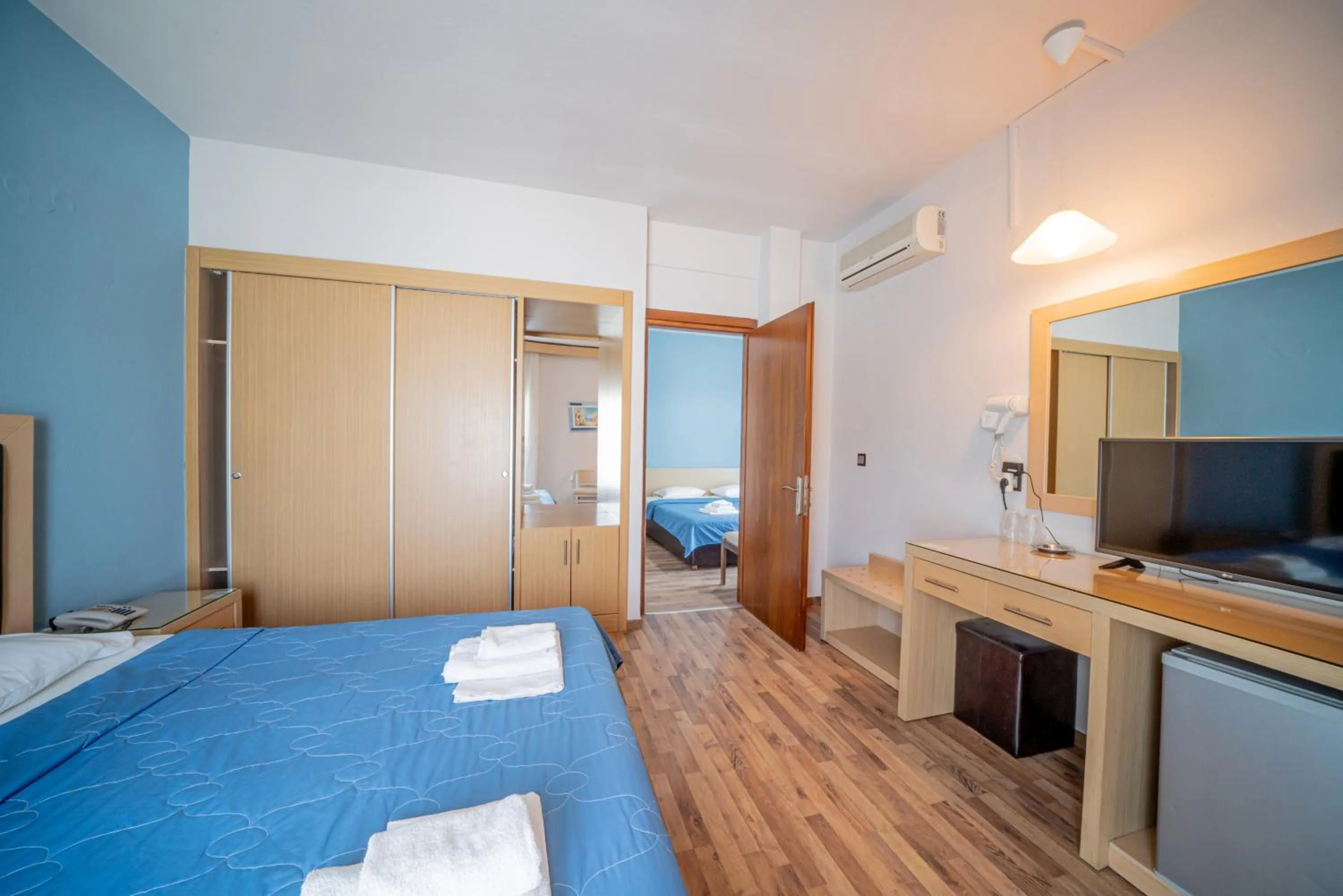 Bed in Hotel Olympion