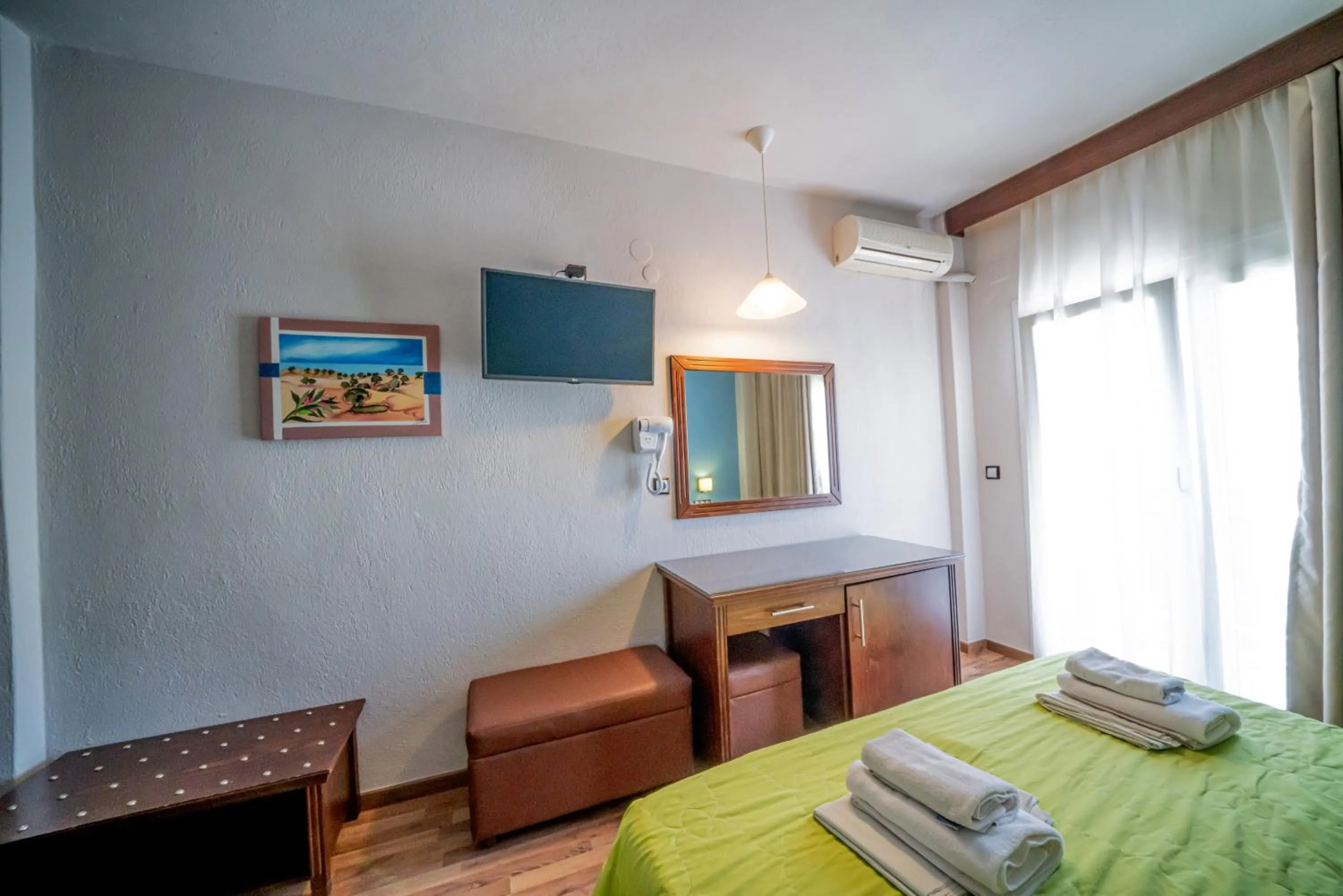 Bed in Hotel Olympion