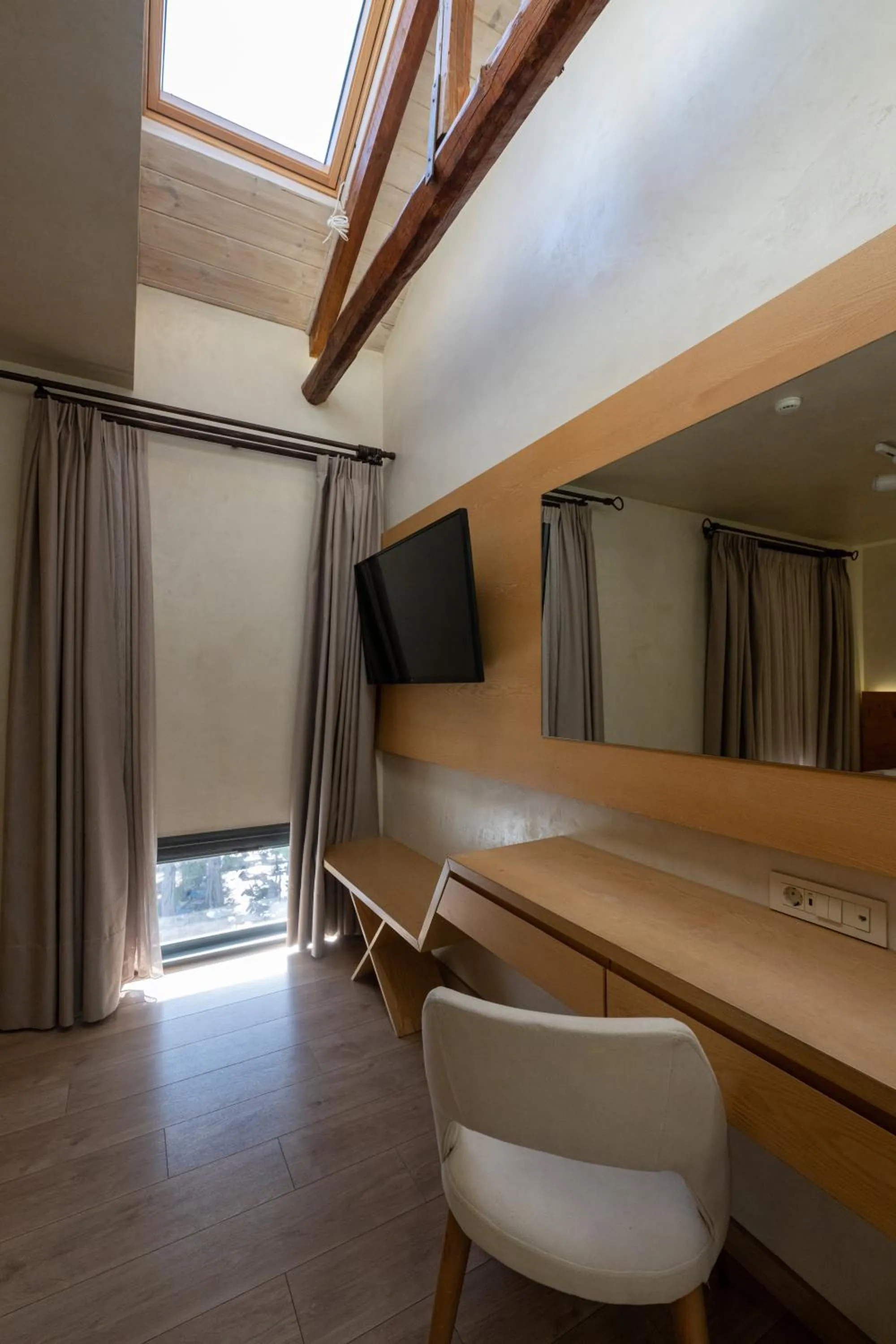 Photo of the whole room in Panellinion Luxury Rooms