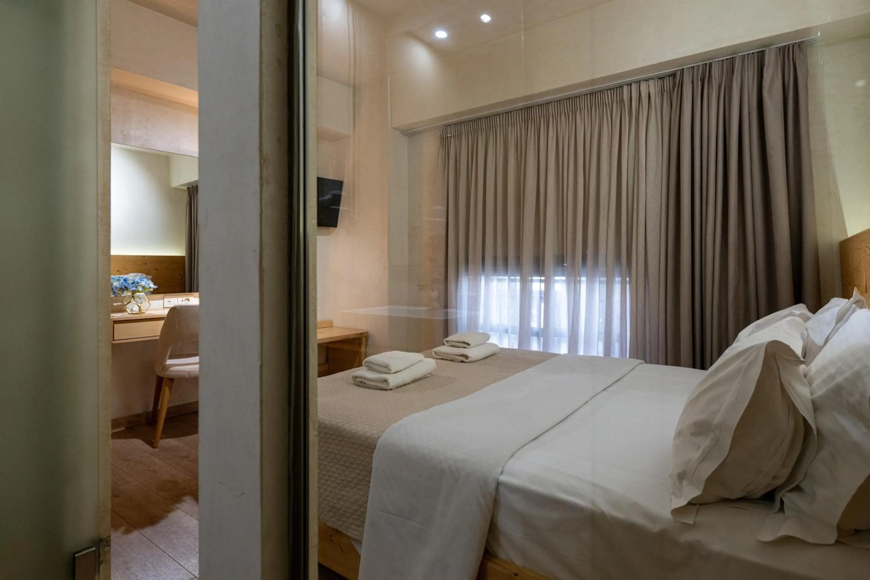 Photo of the whole room, Bed in Panellinion Luxury Rooms