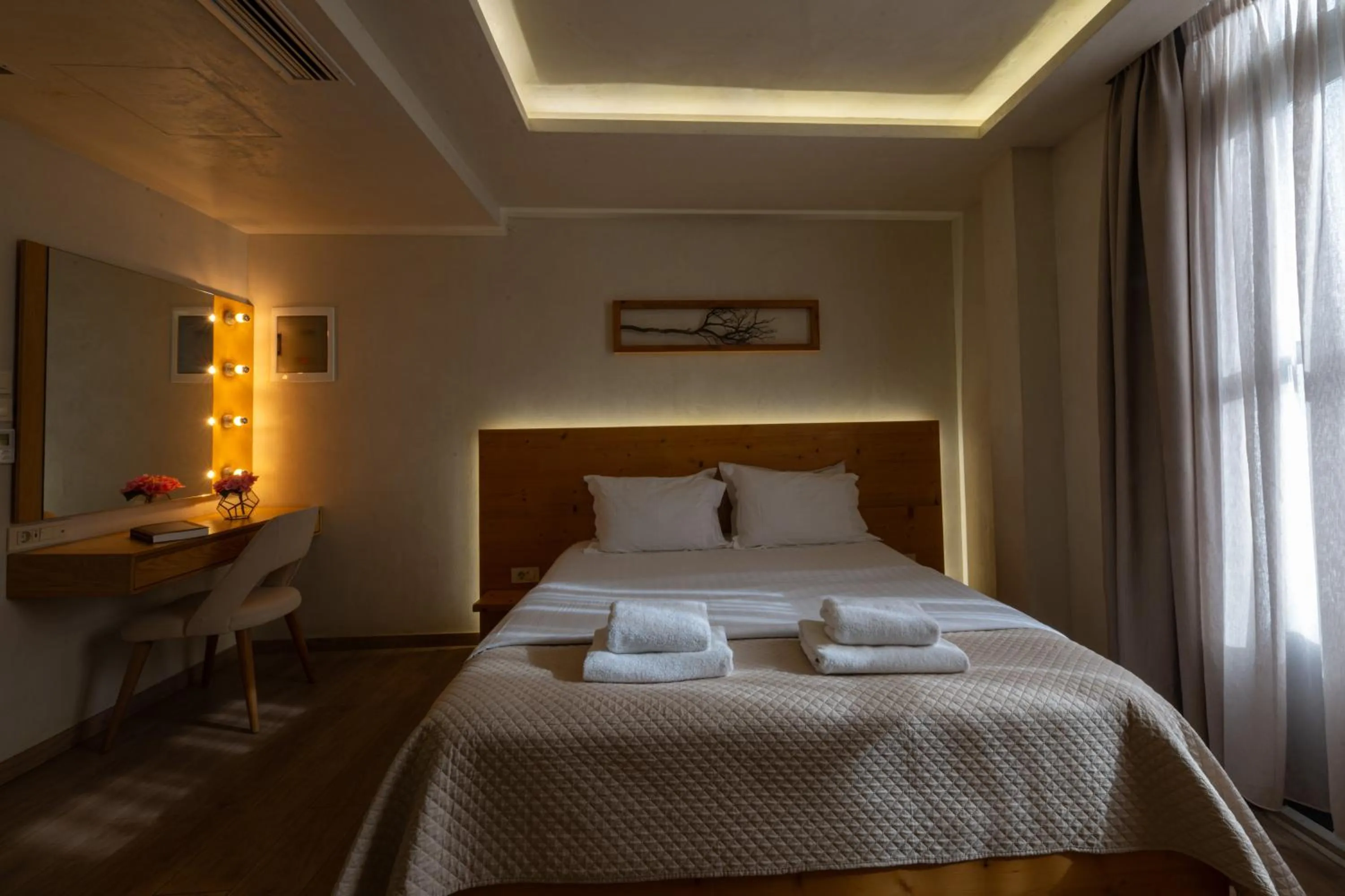 Photo of the whole room, Bed in Panellinion Luxury Rooms