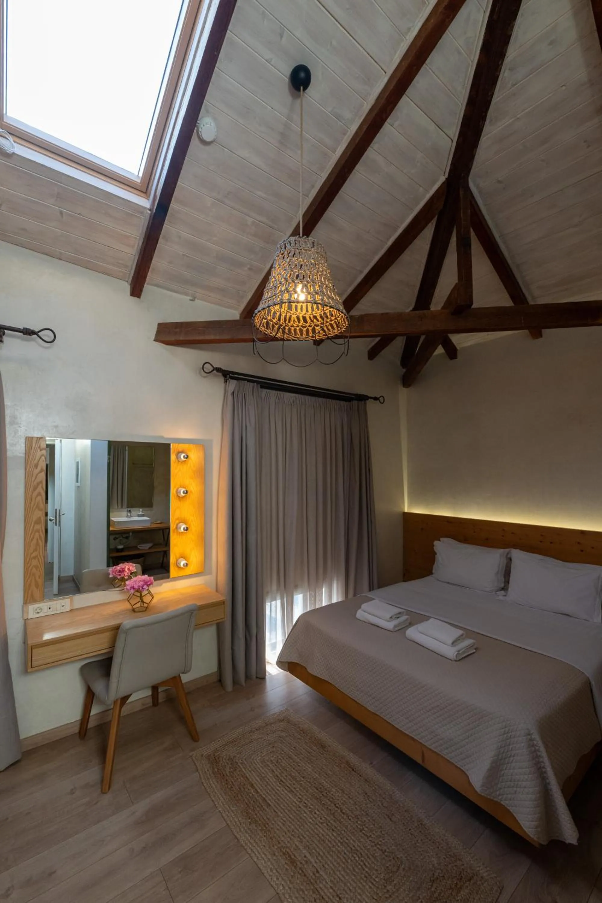 Bed in Panellinion Luxury Rooms