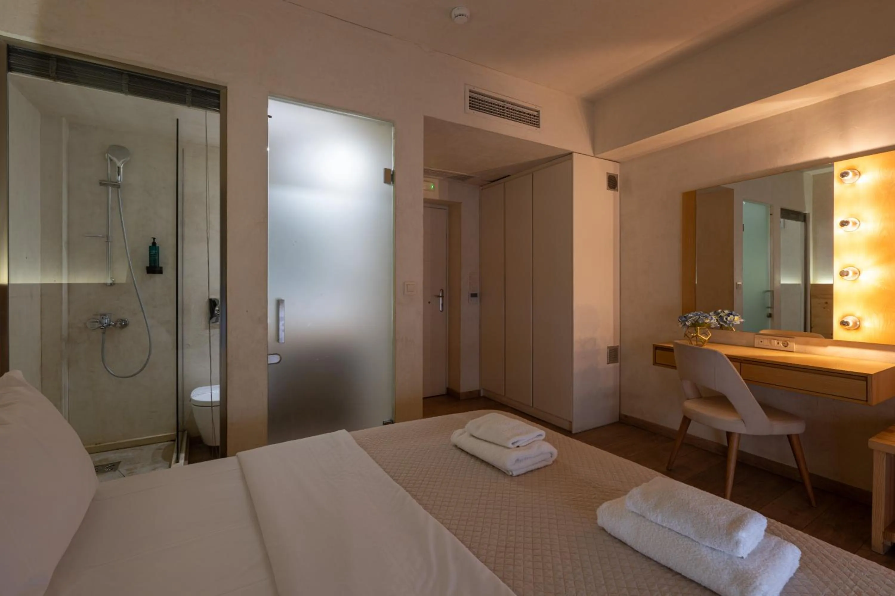 Bed in Panellinion Luxury Rooms