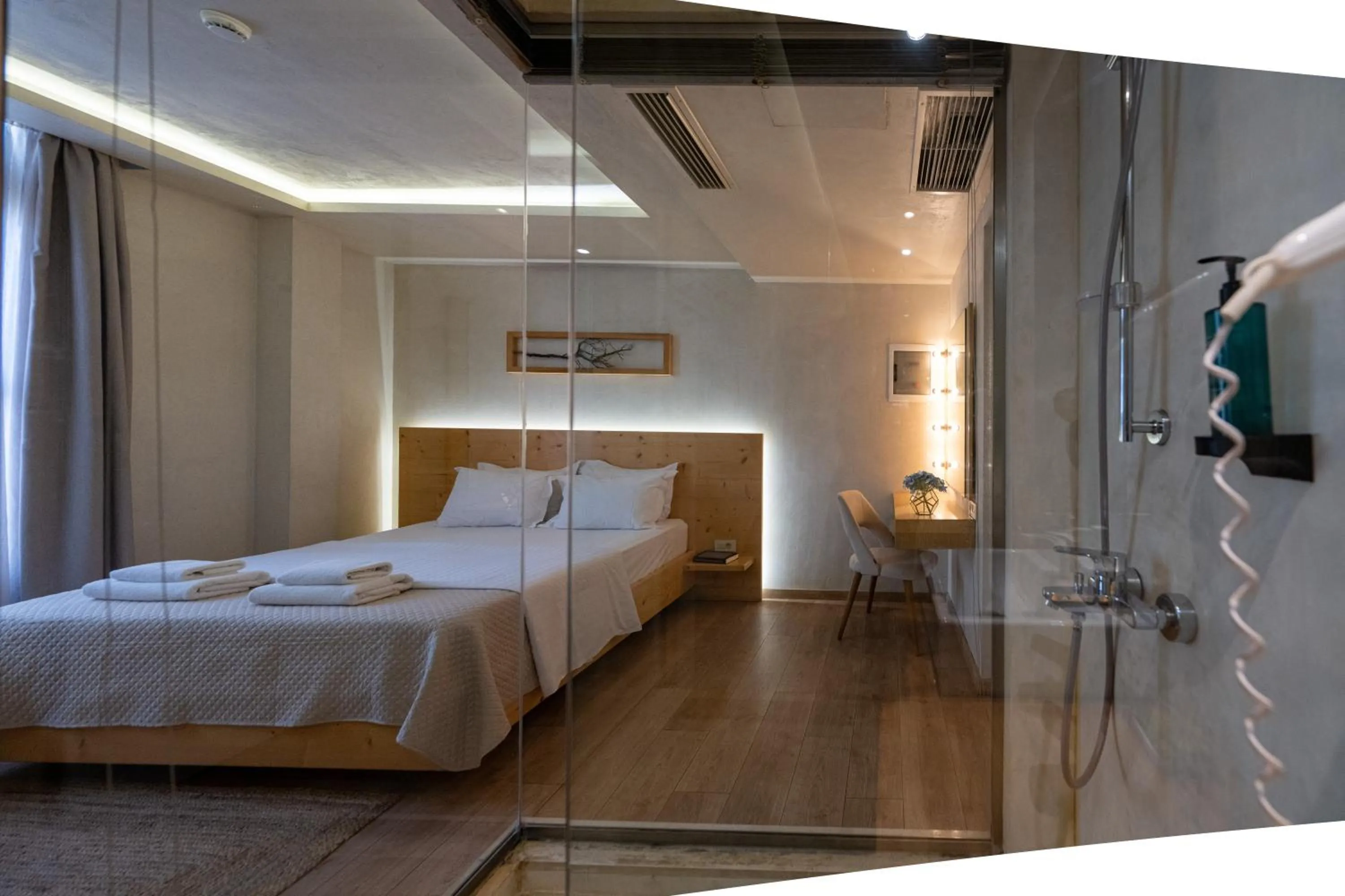 Photo of the whole room, Bed in Panellinion Luxury Rooms