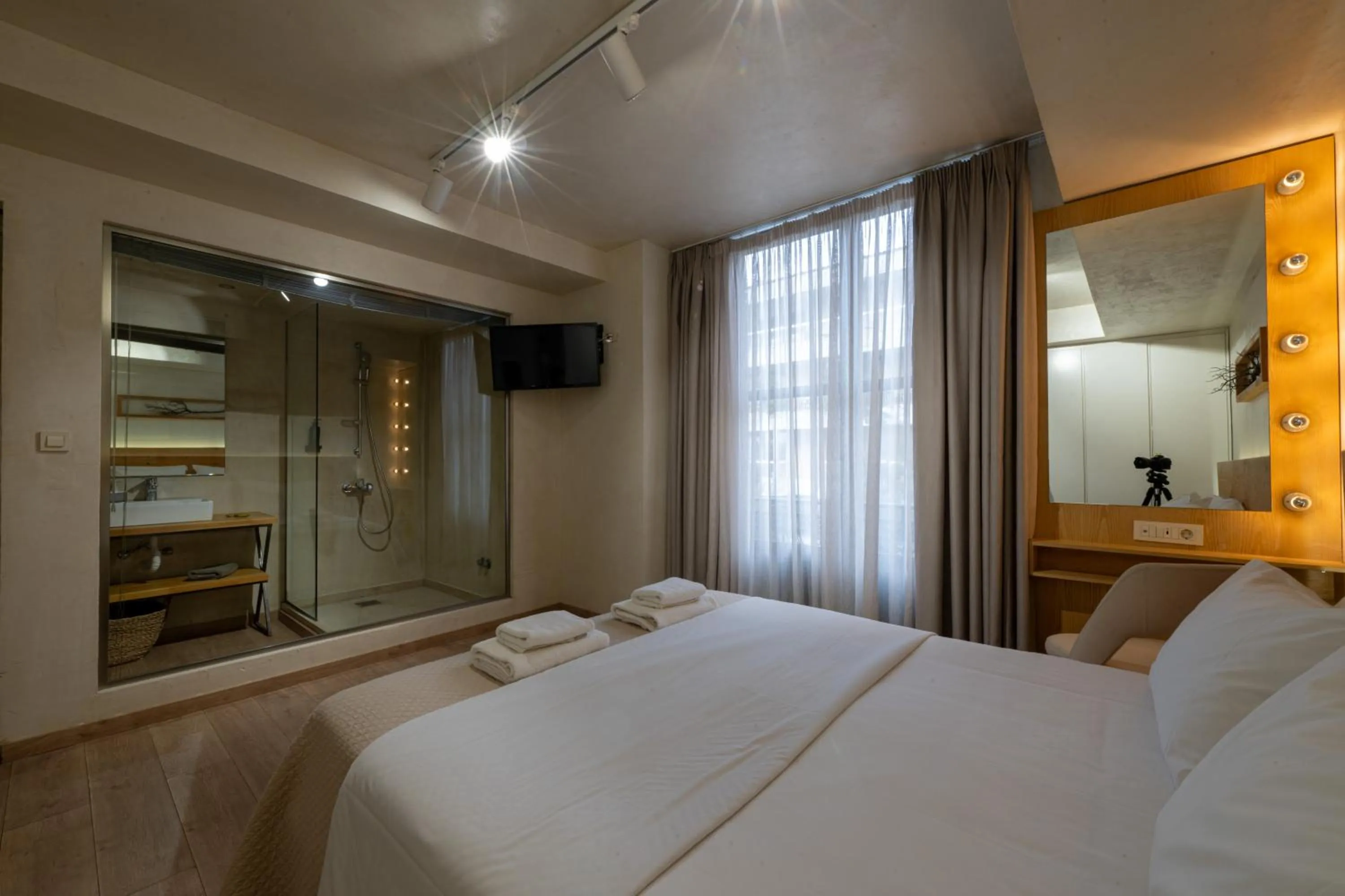 Photo of the whole room, Bed in Panellinion Luxury Rooms