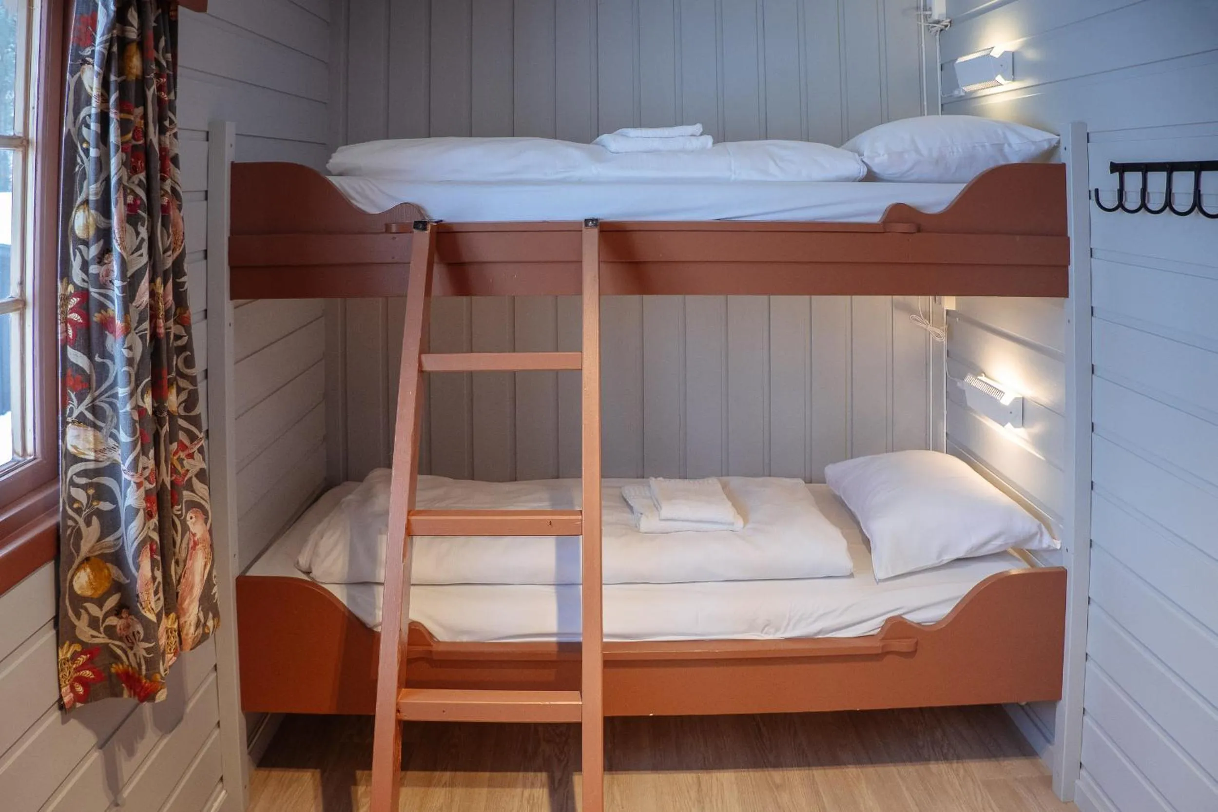Bed in Hunderfossen Cottages