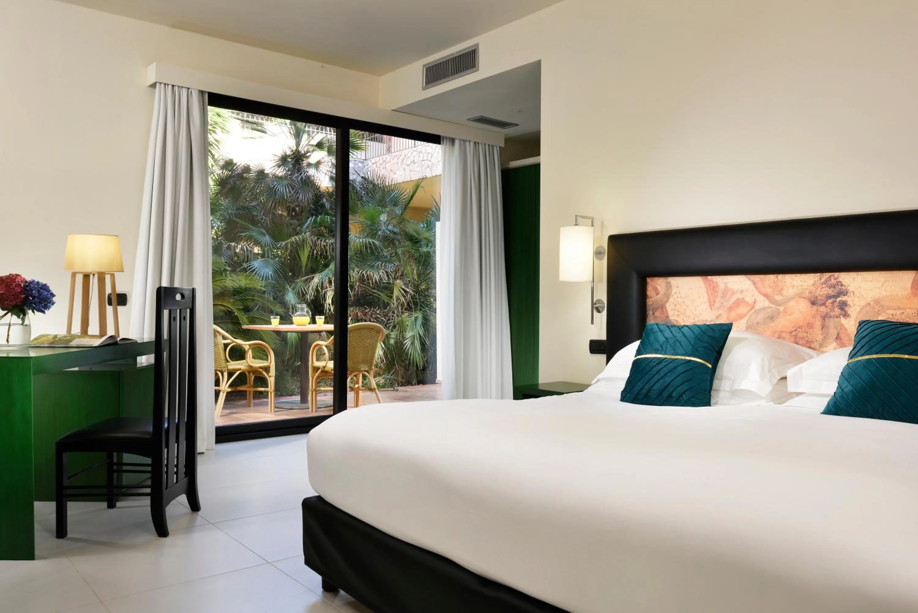 Bed in Argentario Lagoon Resort & Spa