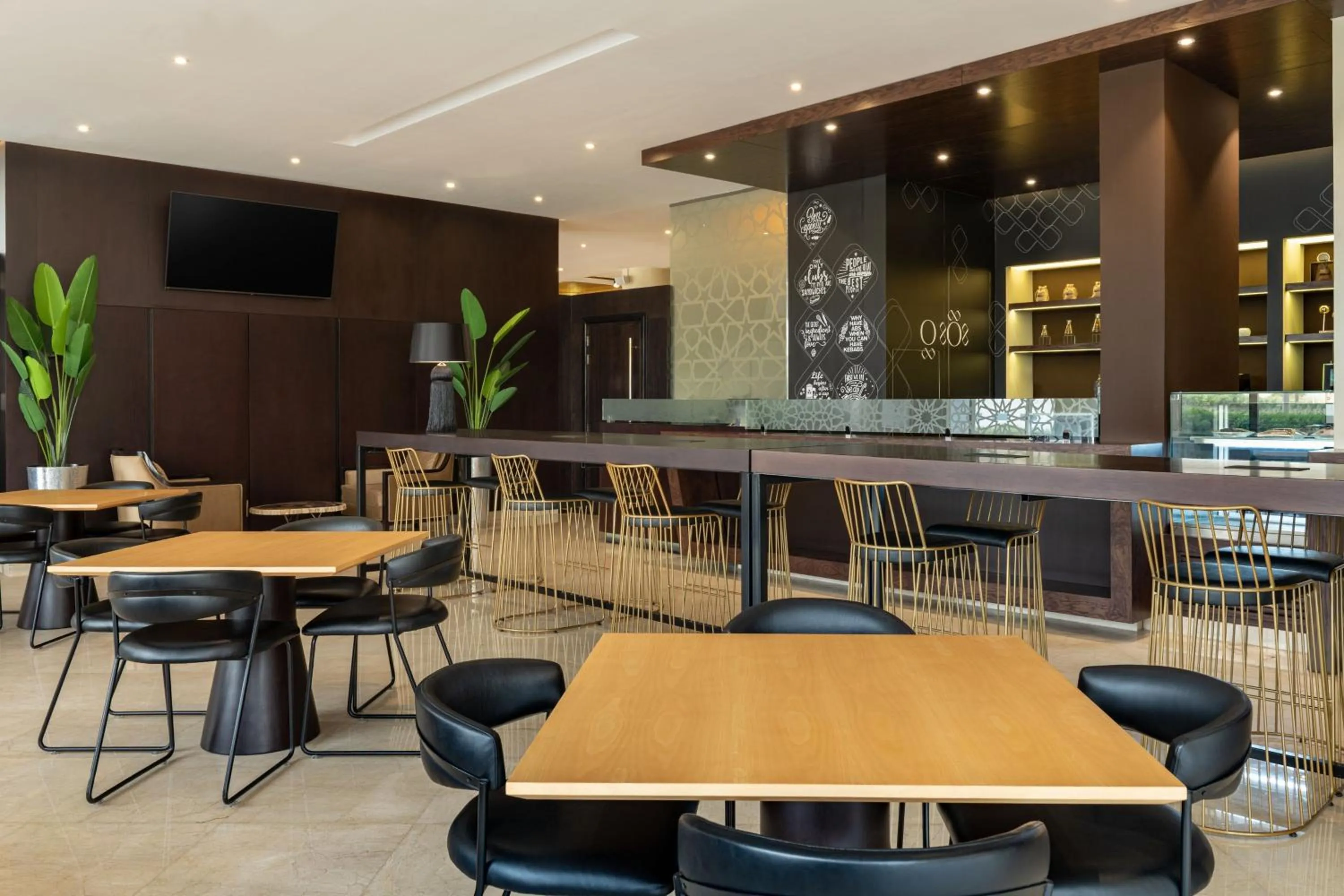 Lounge or bar in Four Points by Sheraton Production City, Dubai