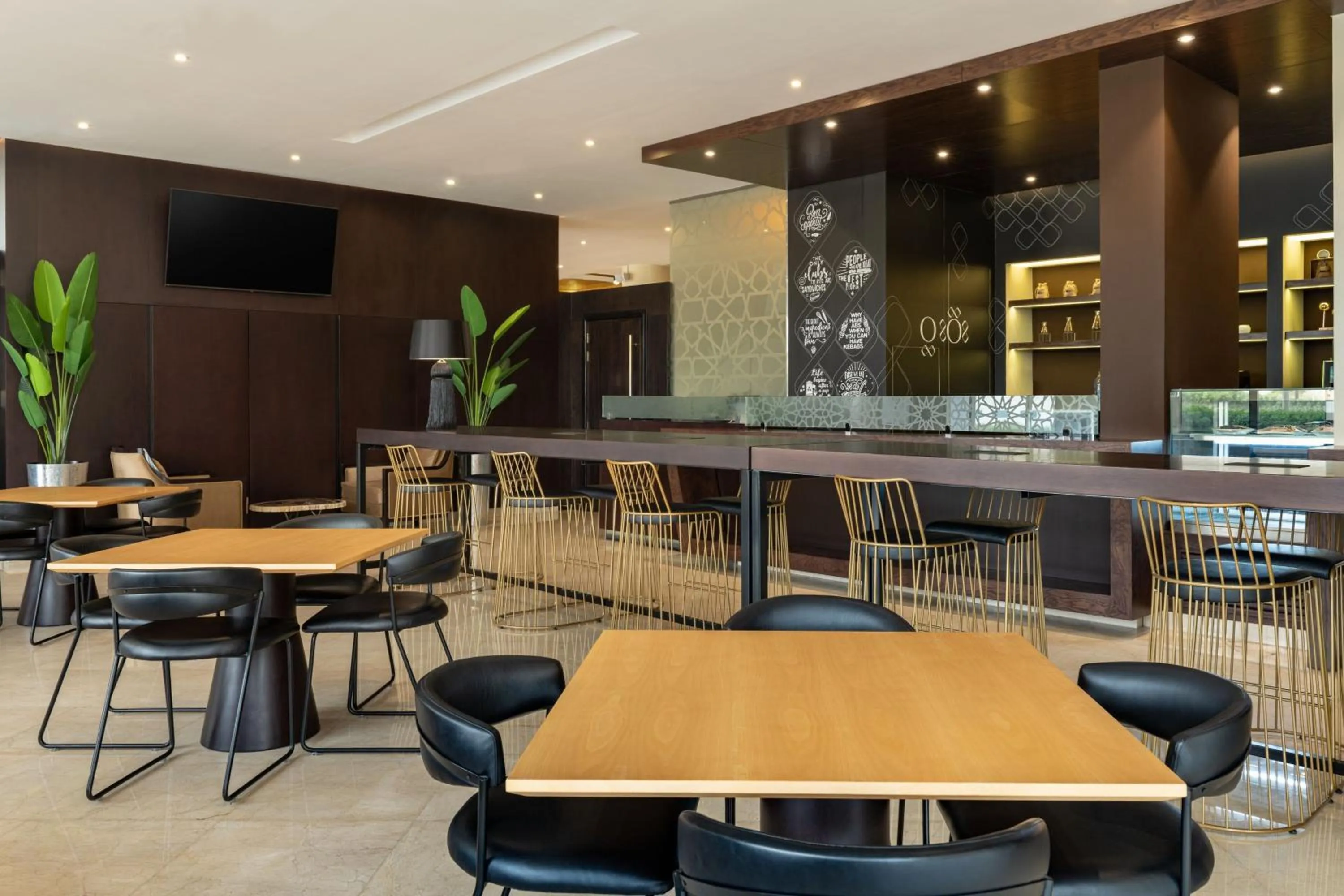 Lounge or bar in Four Points by Sheraton Production City, Dubai