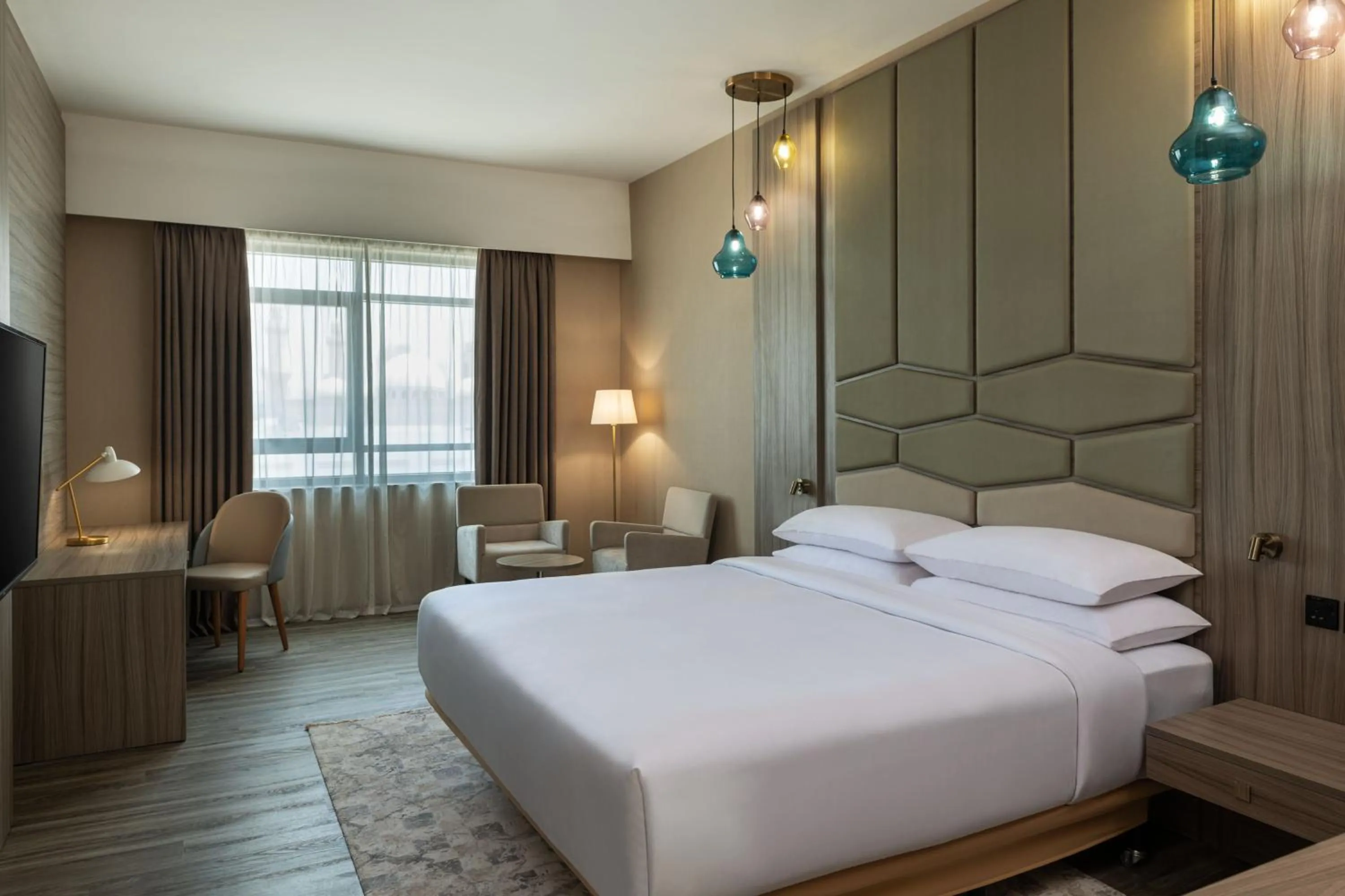 Photo of the whole room, Bed in Four Points by Sheraton Production City, Dubai