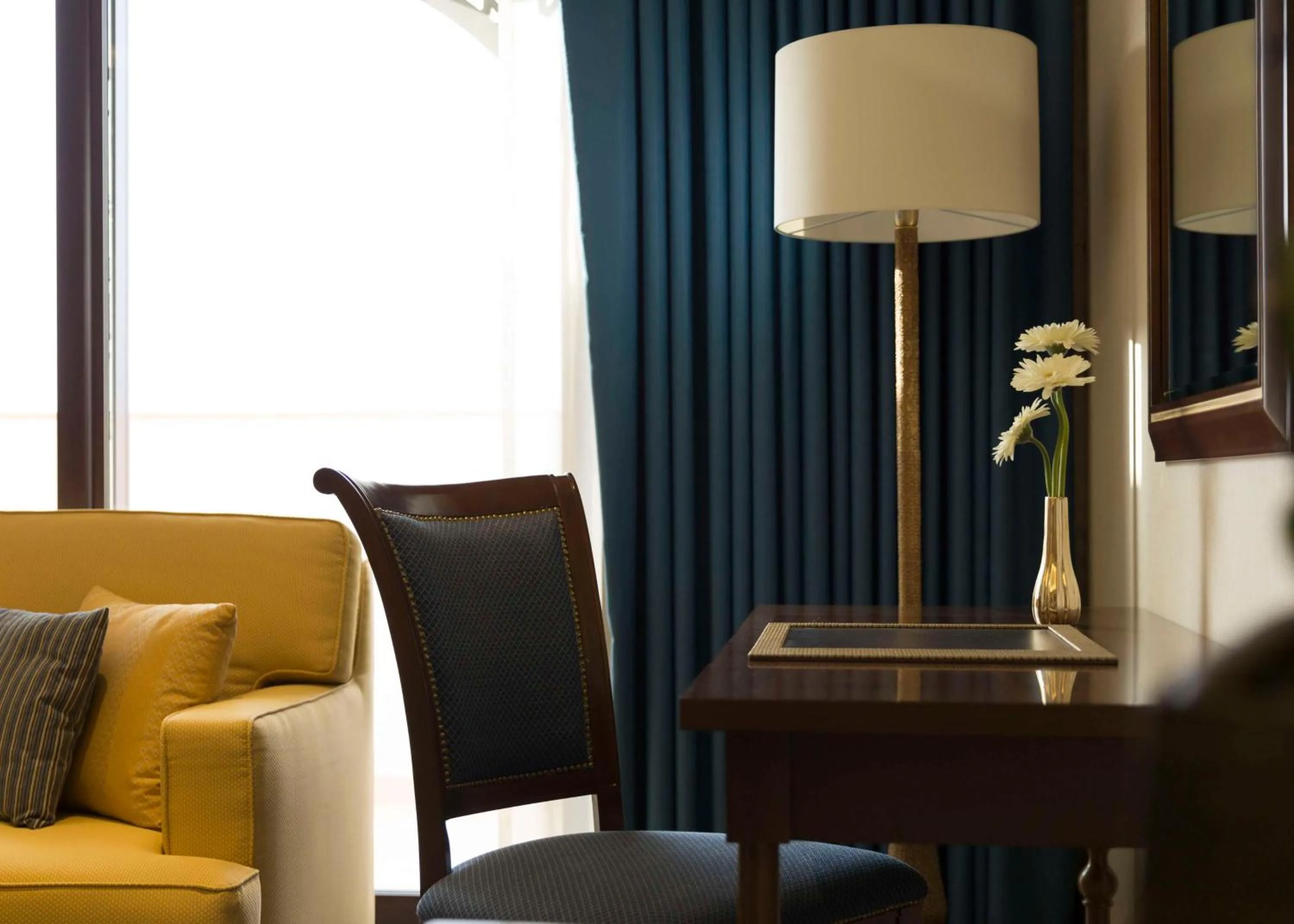 Bedroom in Al Najada Doha Hotel by Tivoli