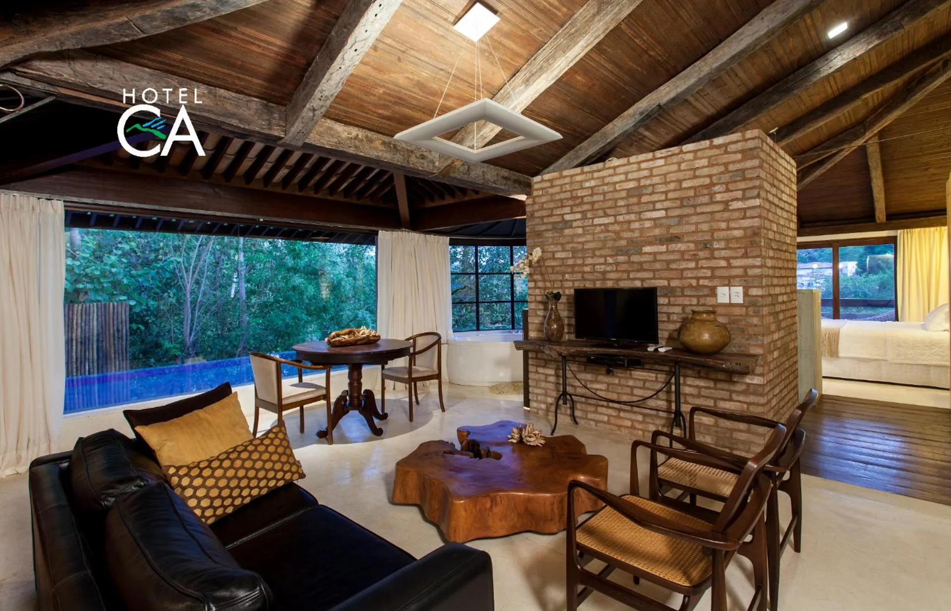 Communal lounge/ TV room in Hotel Canto das Águas - Roteiro de Charme