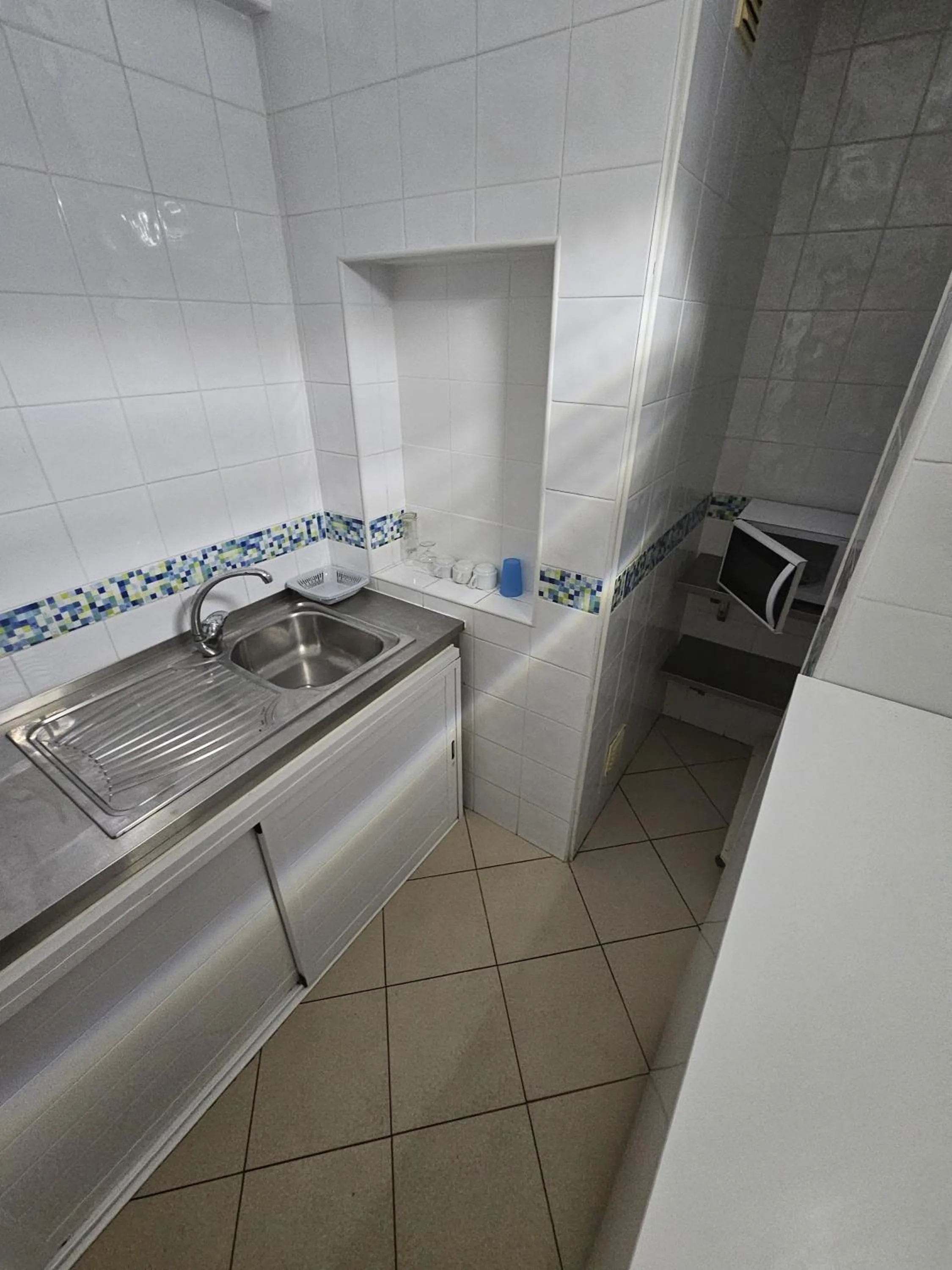 Kitchen or kitchenette in Hotel Adelaide