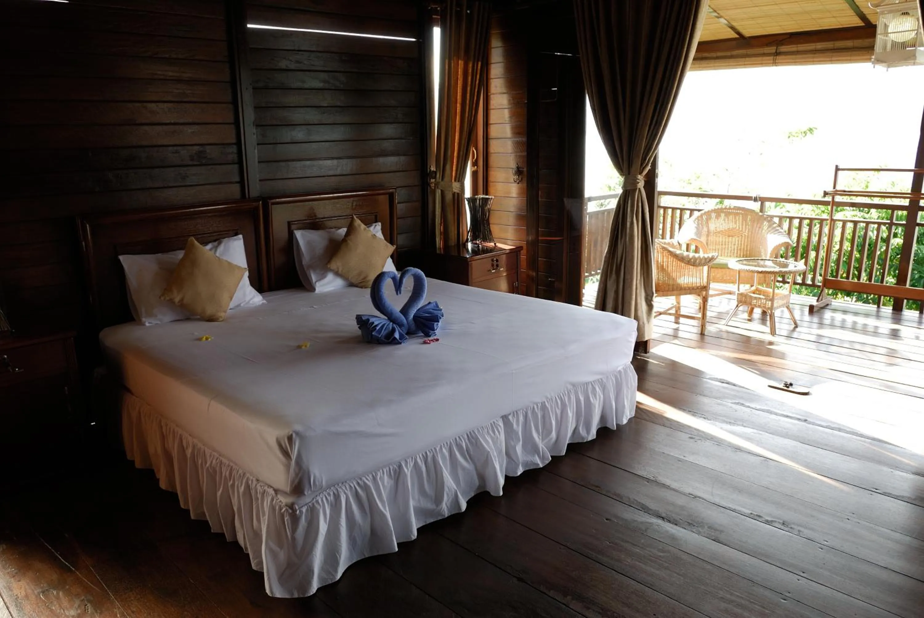 Bed in Bastianos Lembeh Dive Resort