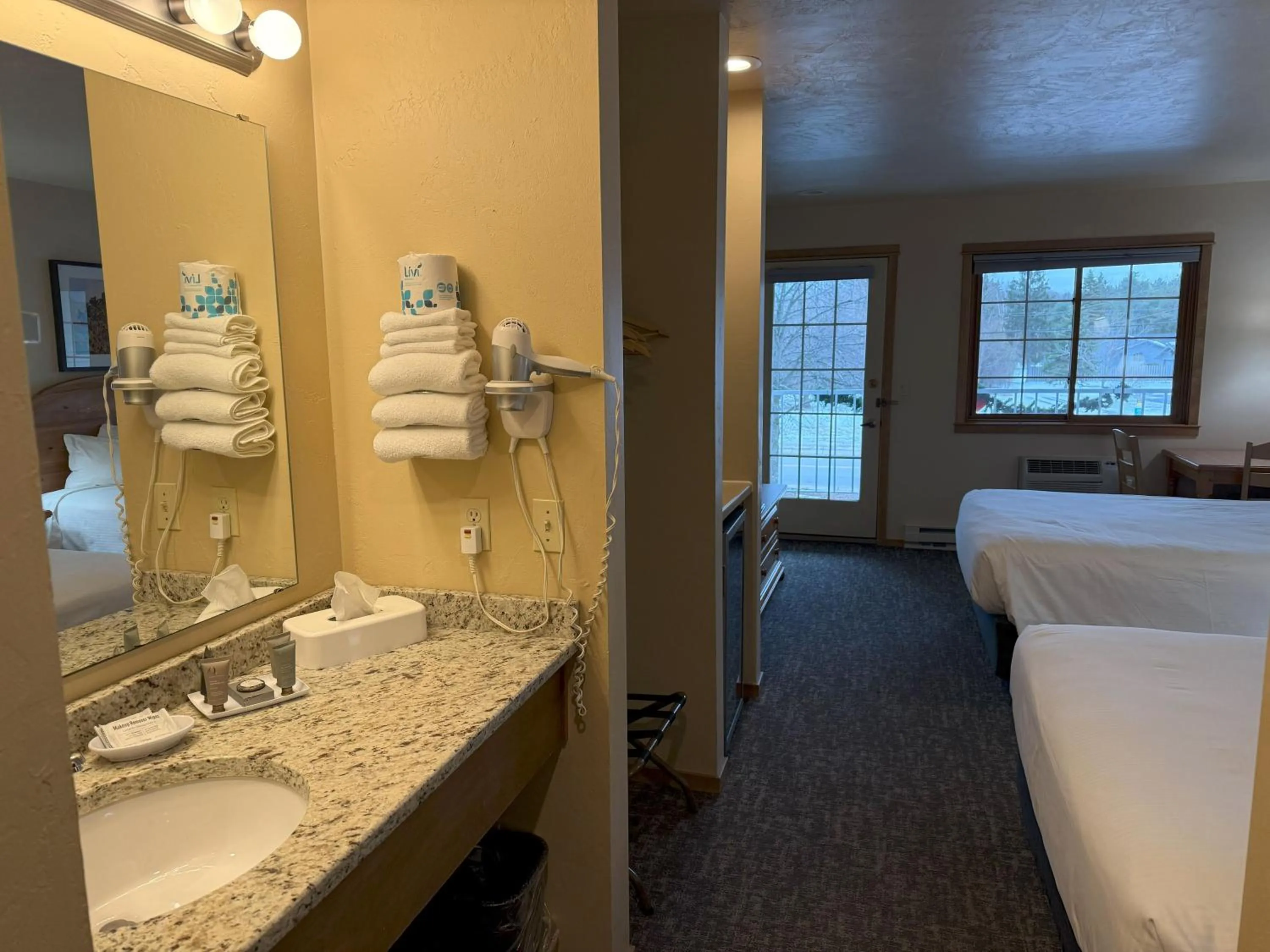 towels, Bed in Homestead Suites - Fish Creek