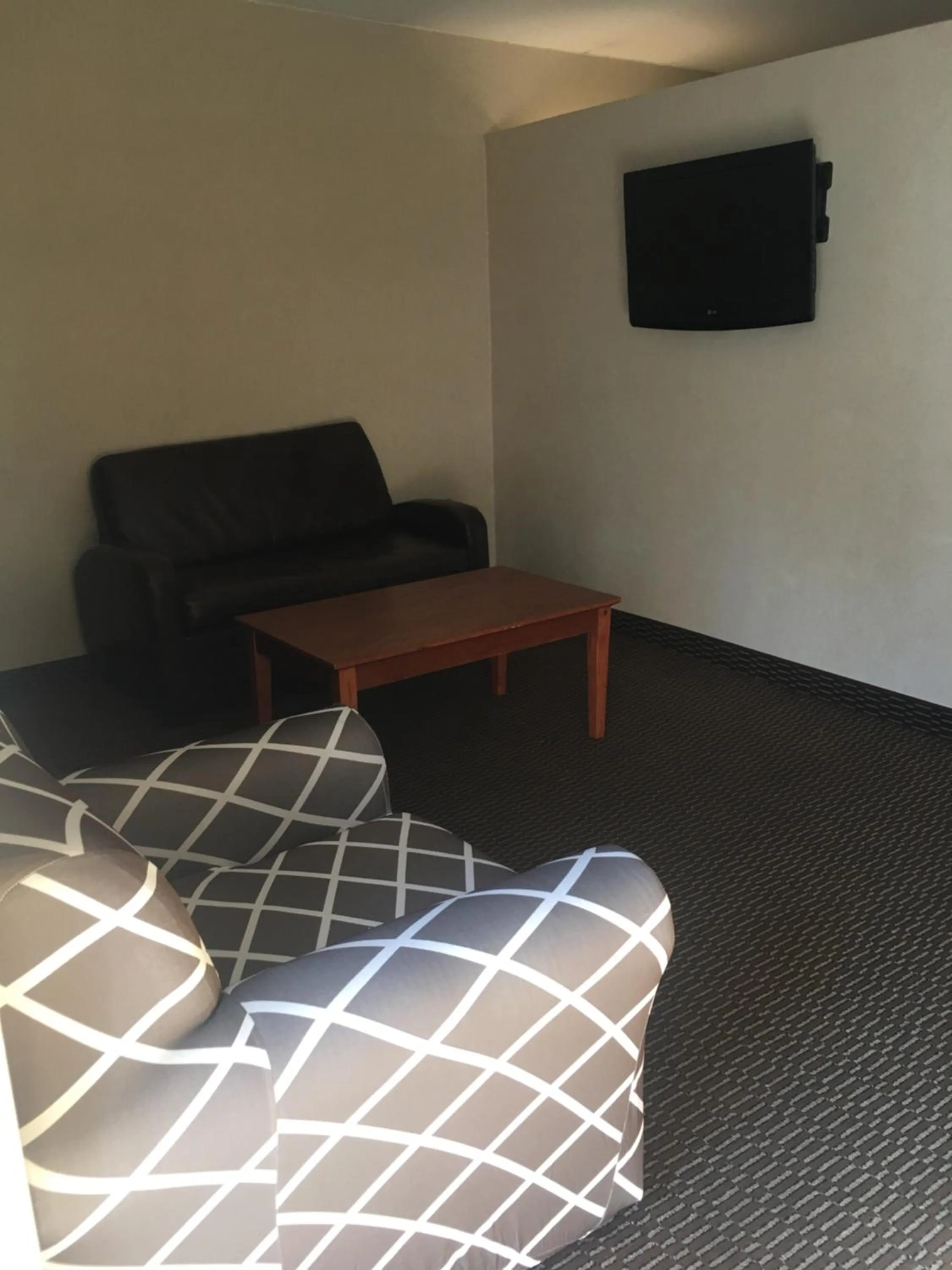 Seating area in Ramada by Wyndham Rockville Centre