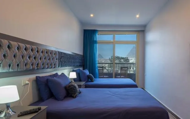 Bedroom, Bed in Pyramids View Inn Bed & Breakfast