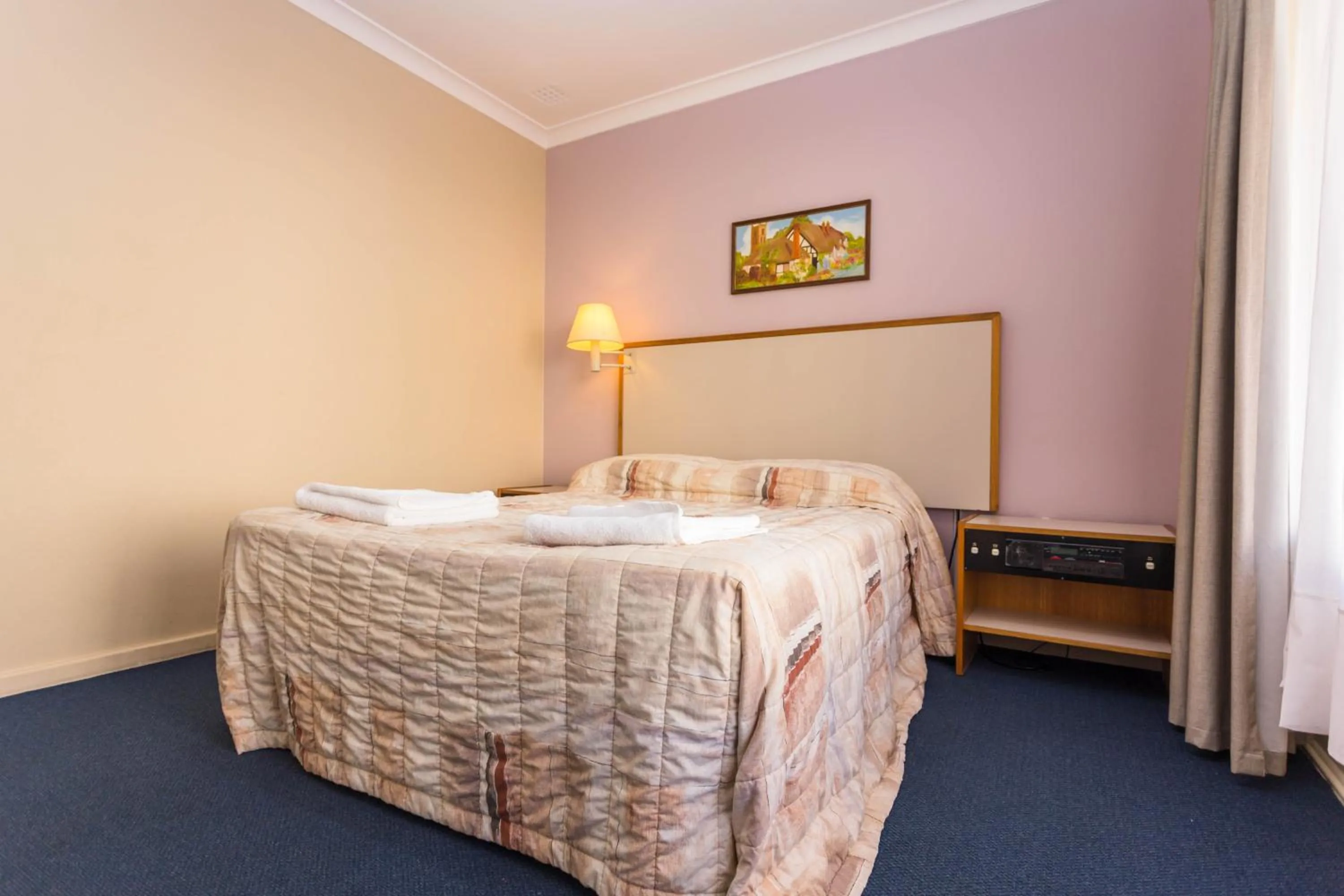 Bed in Sleepwell Motel