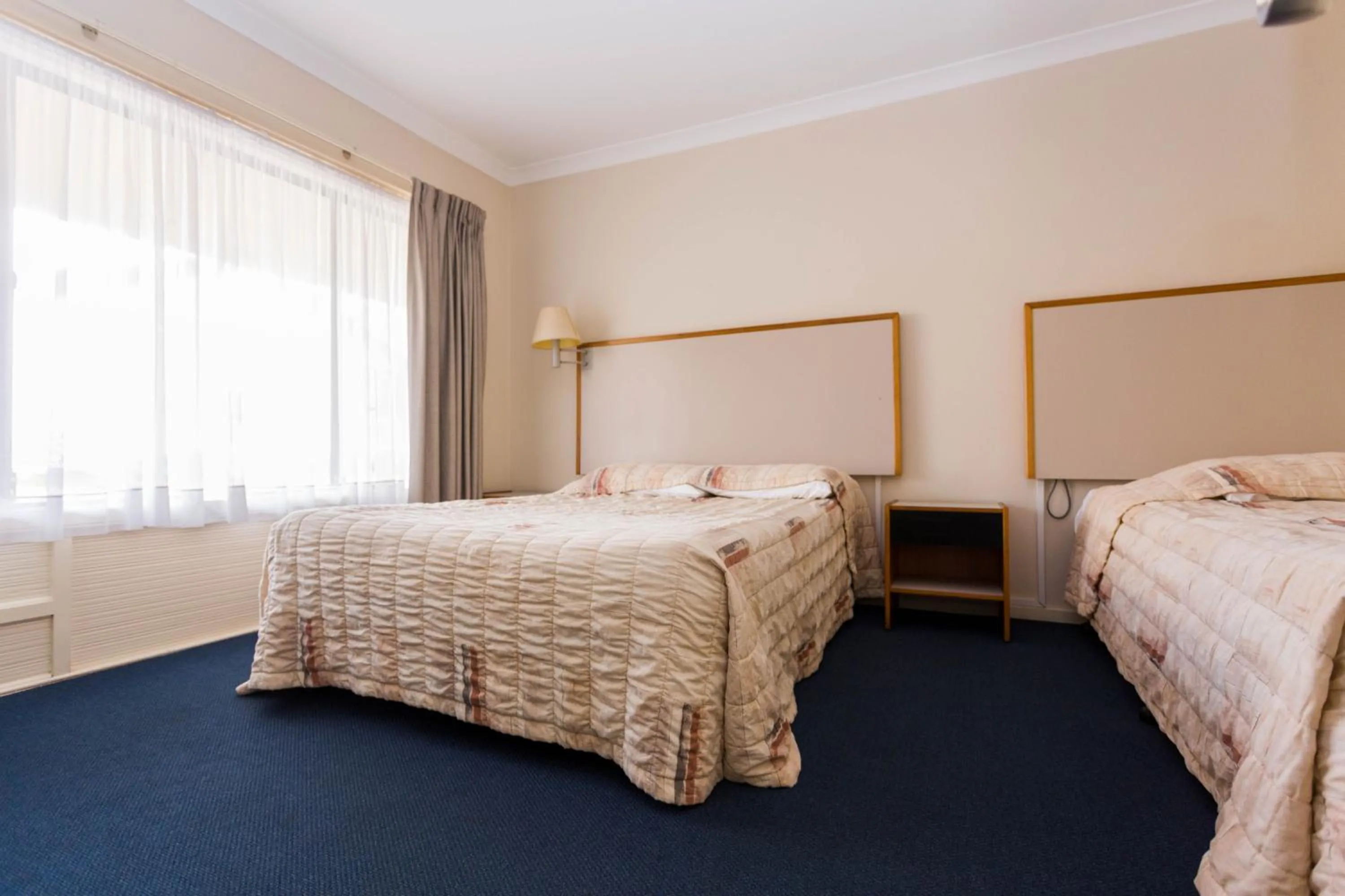 Bed in Sleepwell Motel