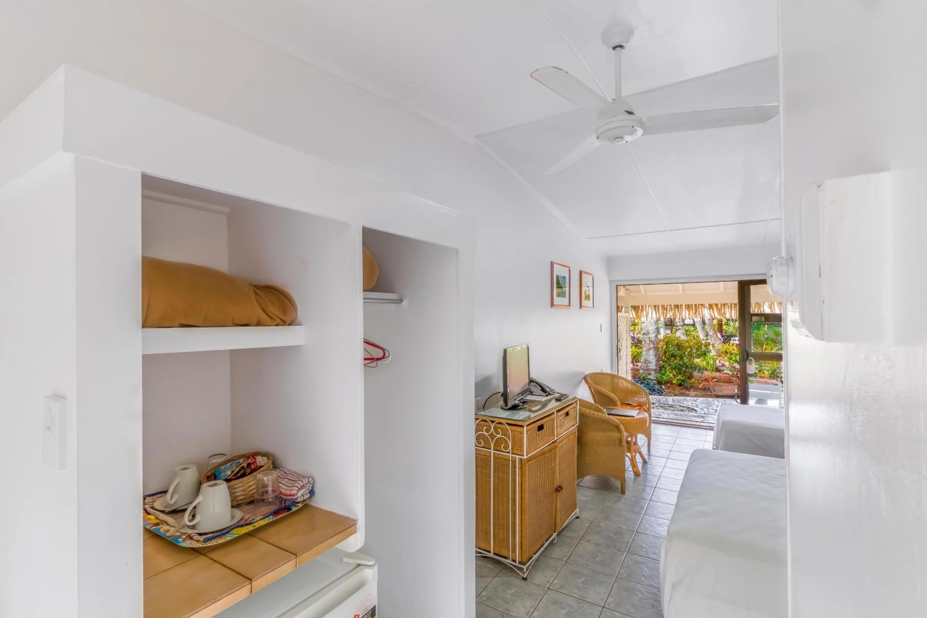 Living room, Bed in Club Raro Resort - Adults Only