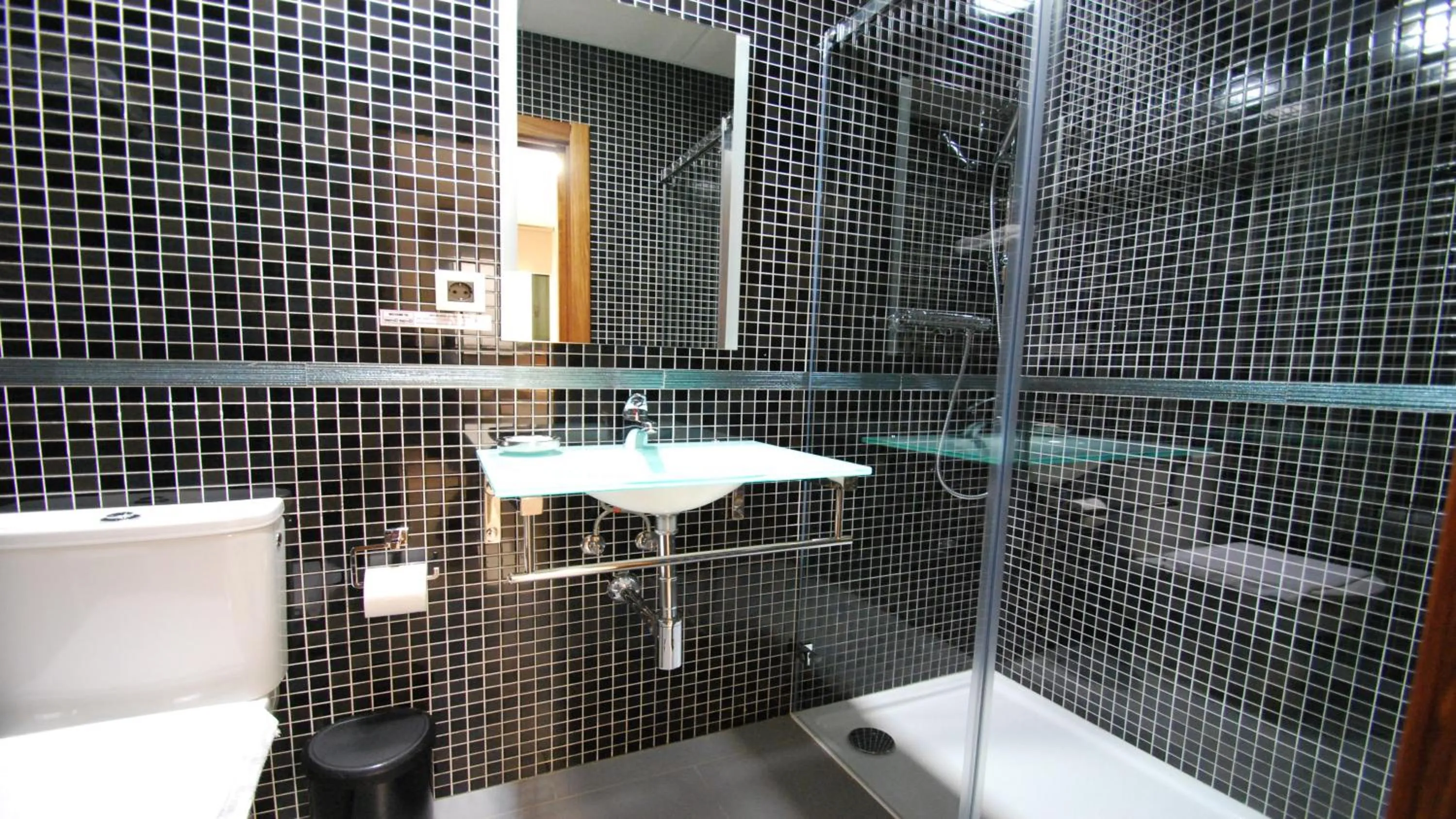 Bathroom in Apartamentos Living Sevilla Centro Maestranza