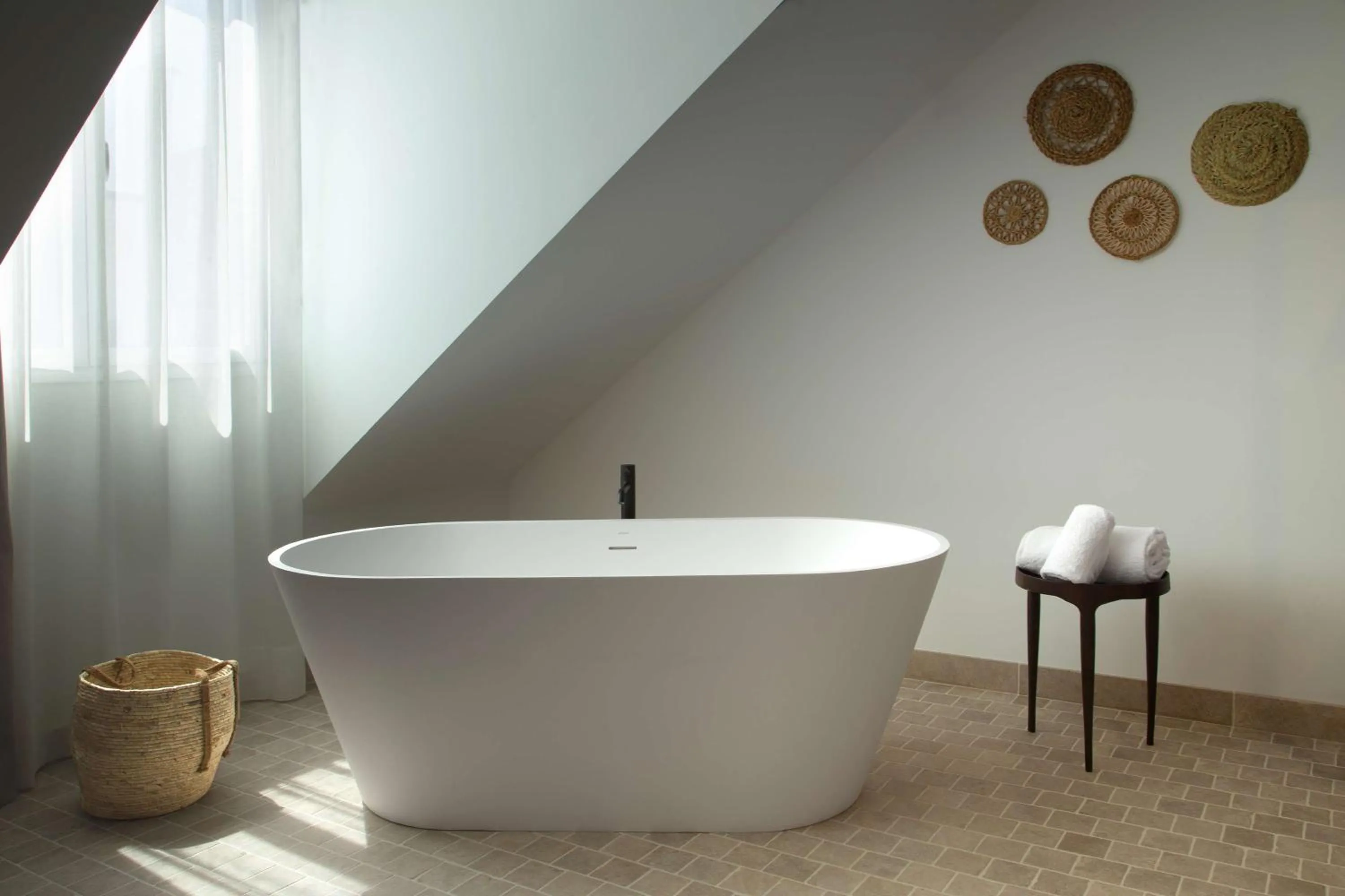 Bathroom in Atocha Hotel Madrid, Tapestry Collection by Hilton