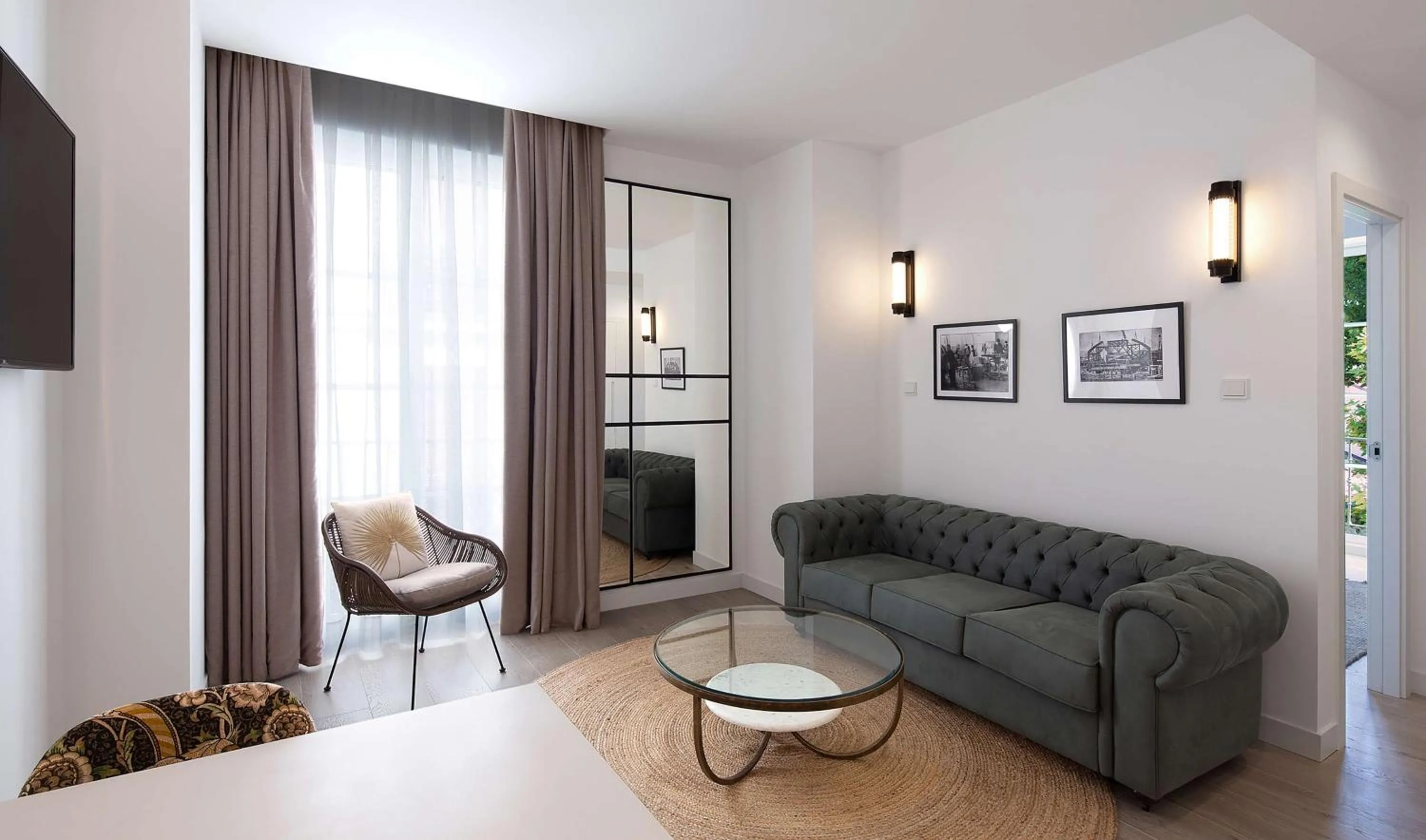 Living room in Atocha Hotel Madrid, Tapestry Collection by Hilton