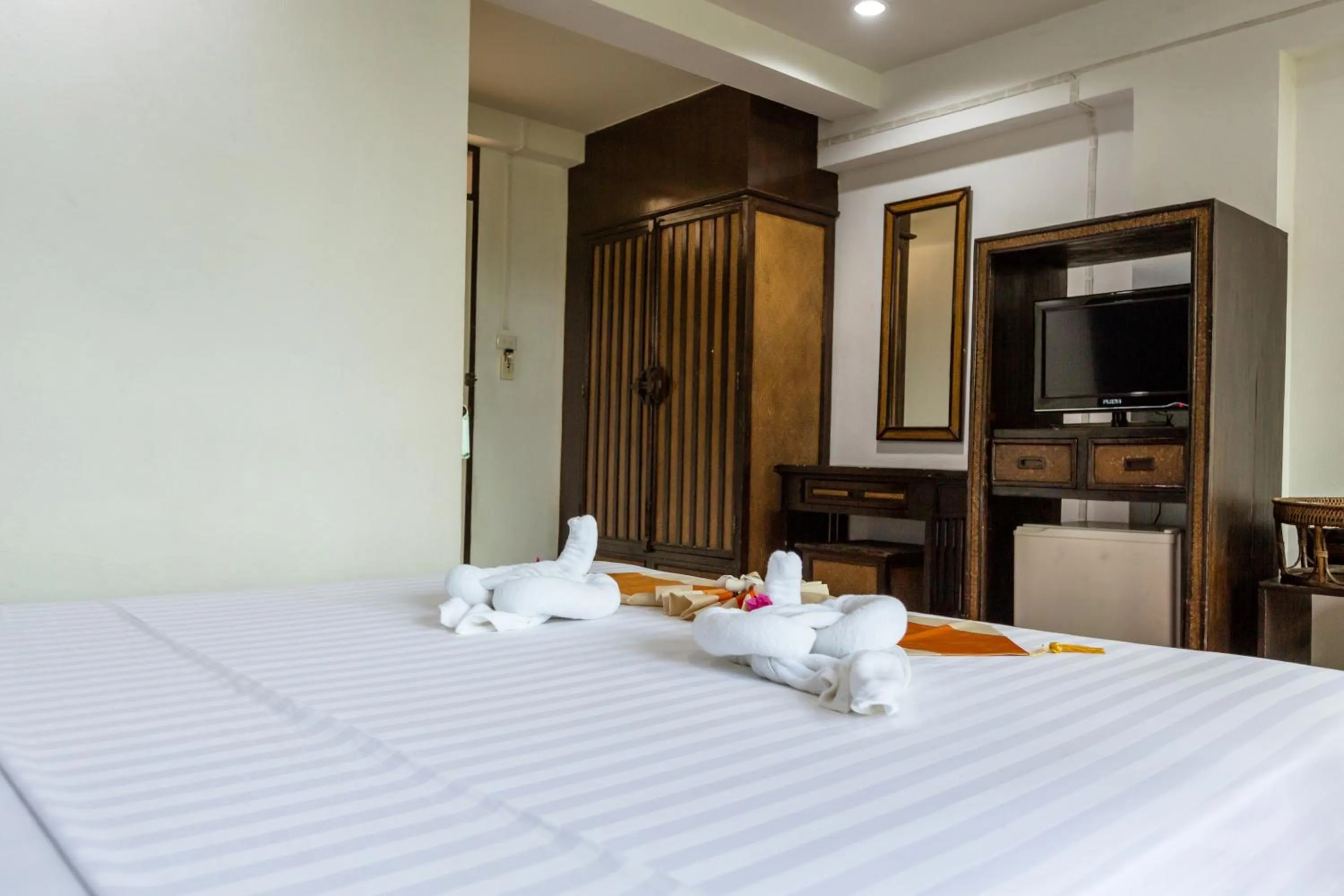 Bed in PorterHouse Beach Hotel