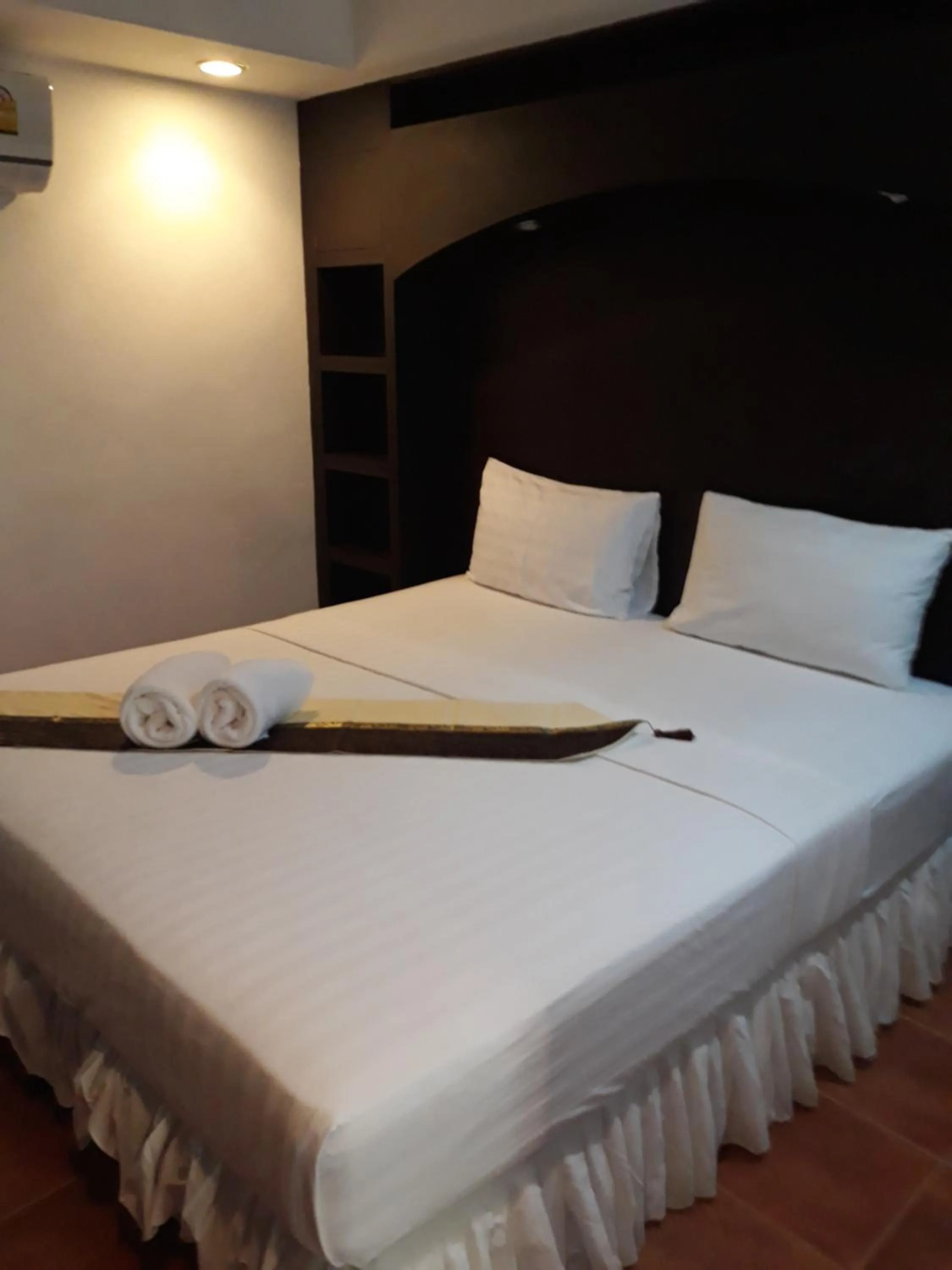 Bed in PorterHouse Beach Hotel