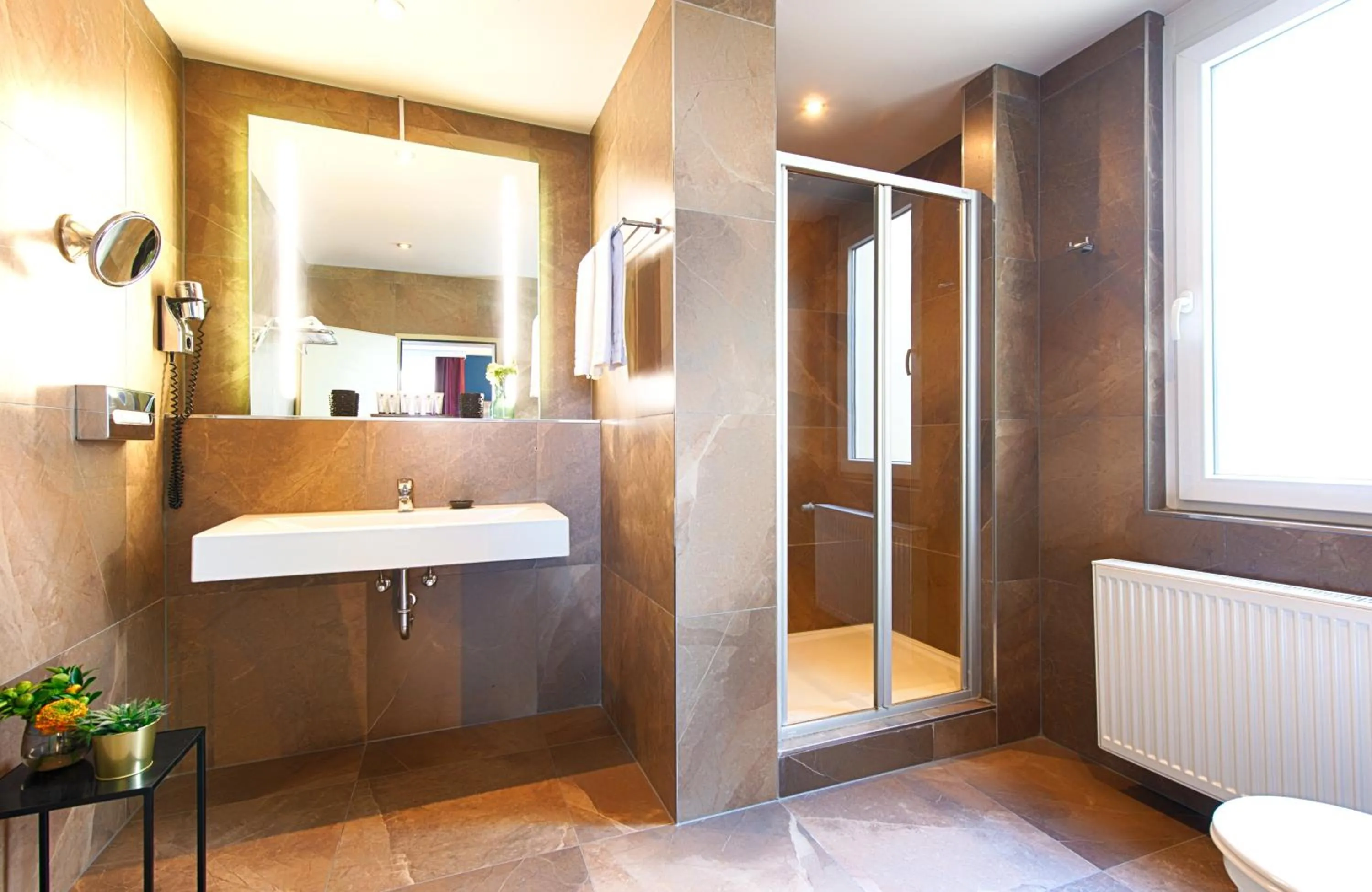 Bathroom in NYX Hotel Mannheim by Leonardo Hotels