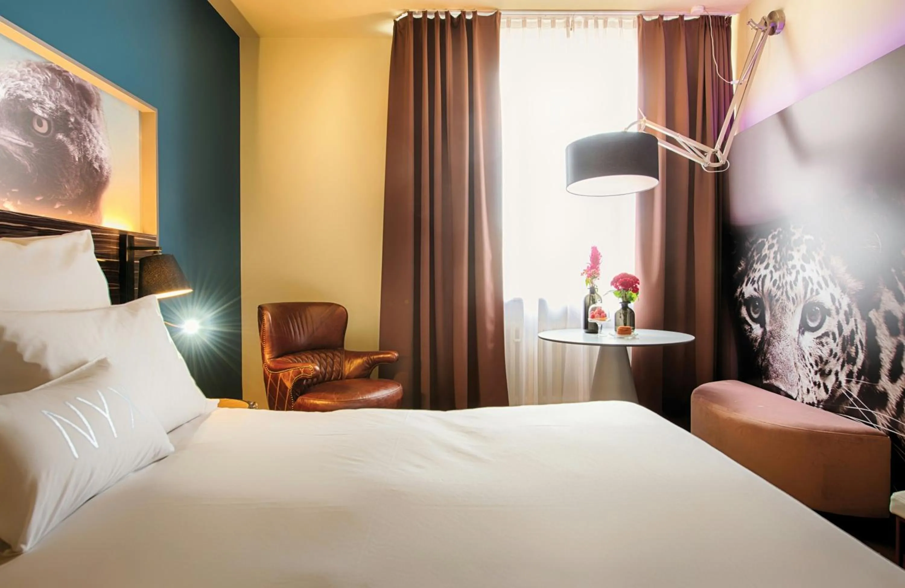 Photo of the whole room, Bed in NYX Hotel Mannheim by Leonardo Hotels