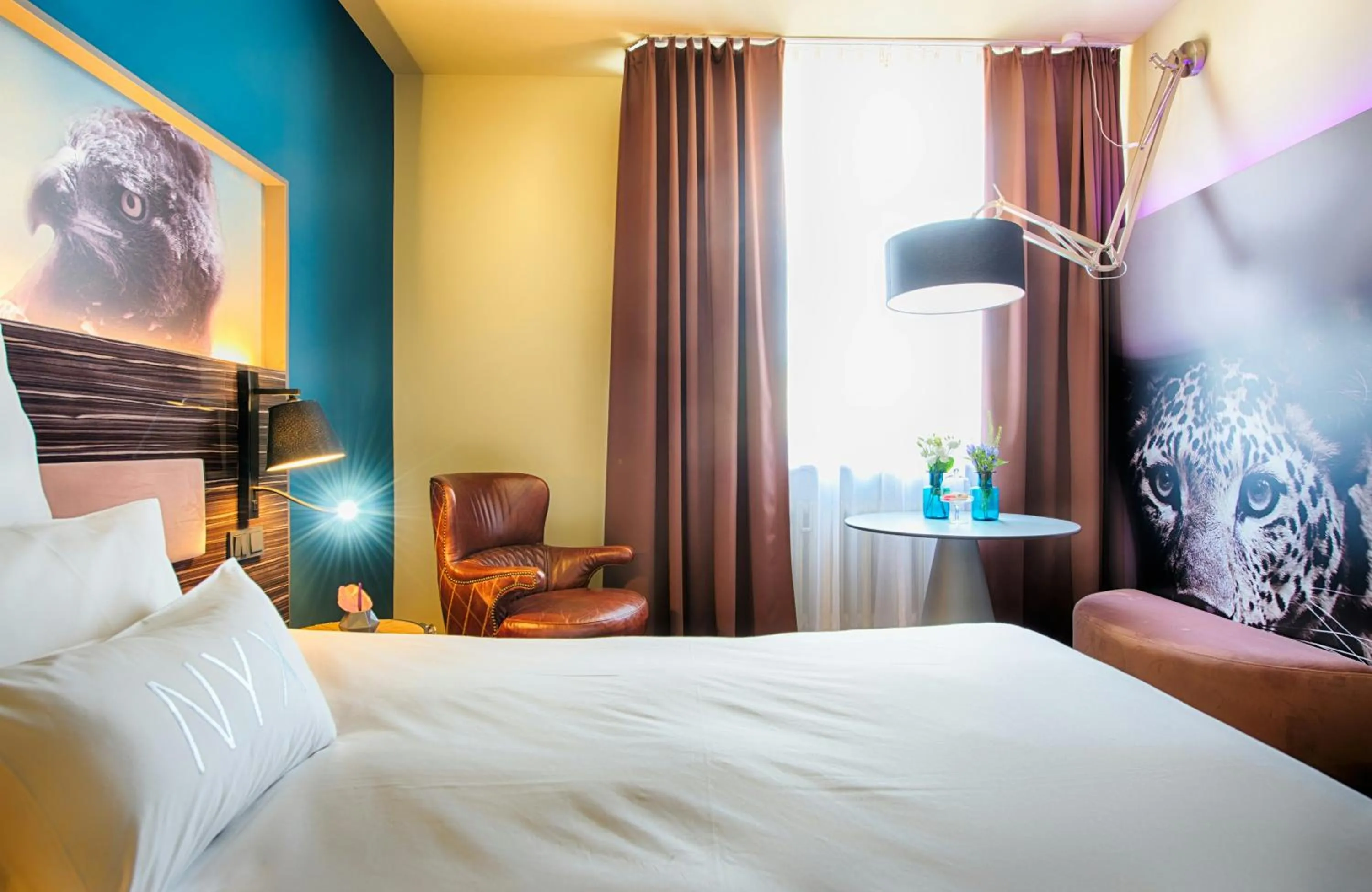 Photo of the whole room, Bed in NYX Hotel Mannheim by Leonardo Hotels