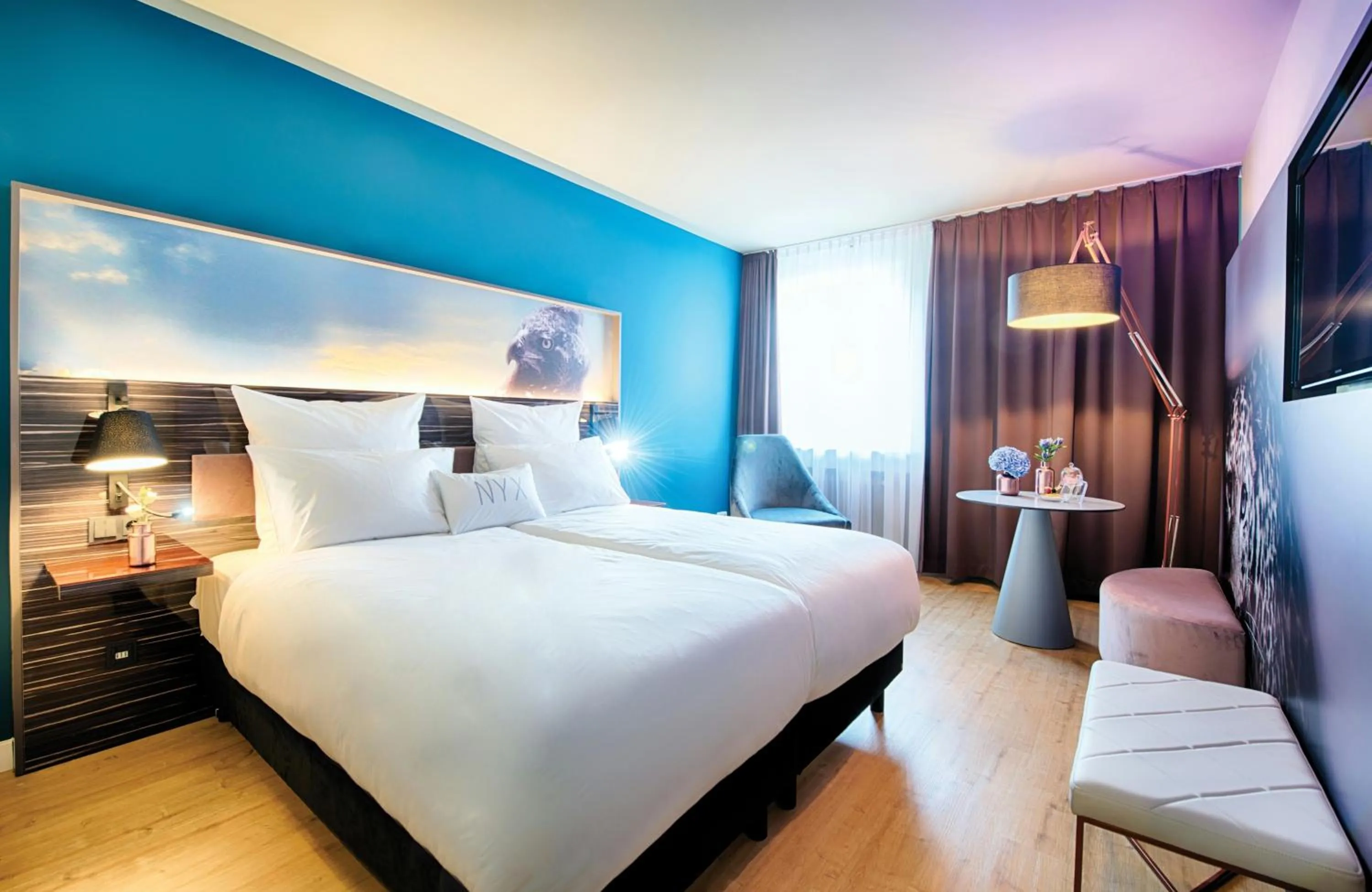 Photo of the whole room, Bed in NYX Hotel Mannheim by Leonardo Hotels