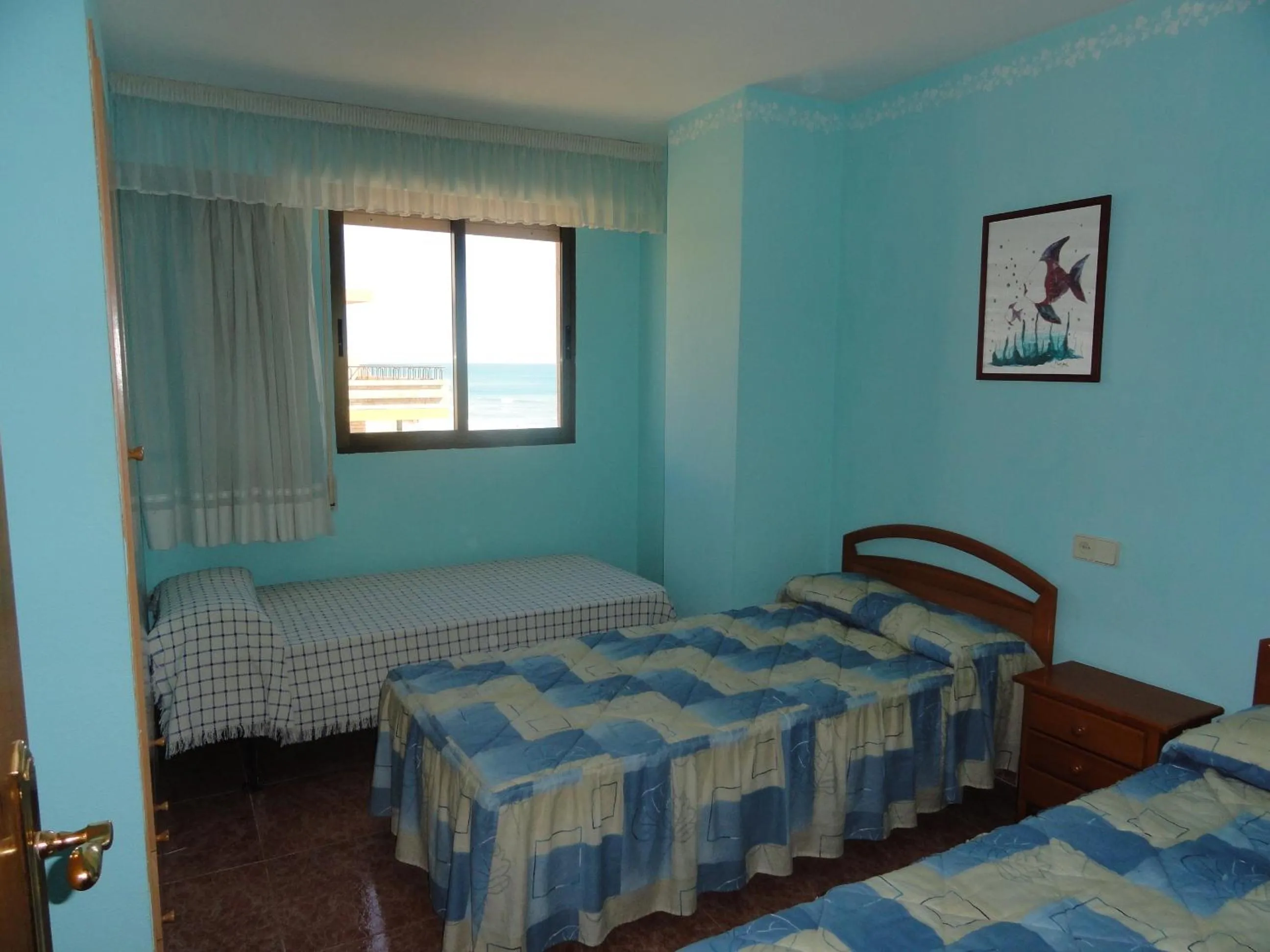 Photo of the whole room in Apartamentos Raymar