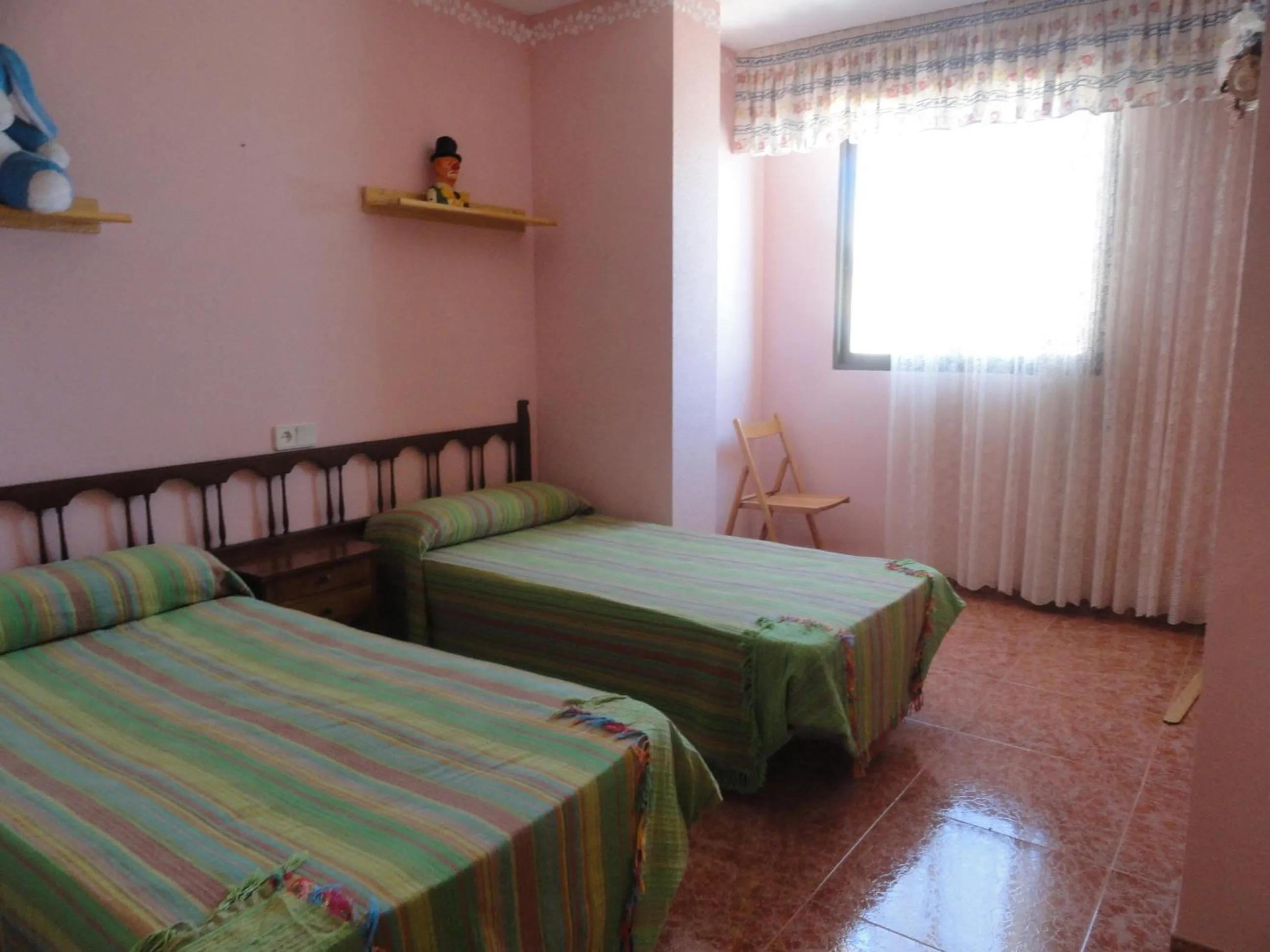 Photo of the whole room in Apartamentos Raymar