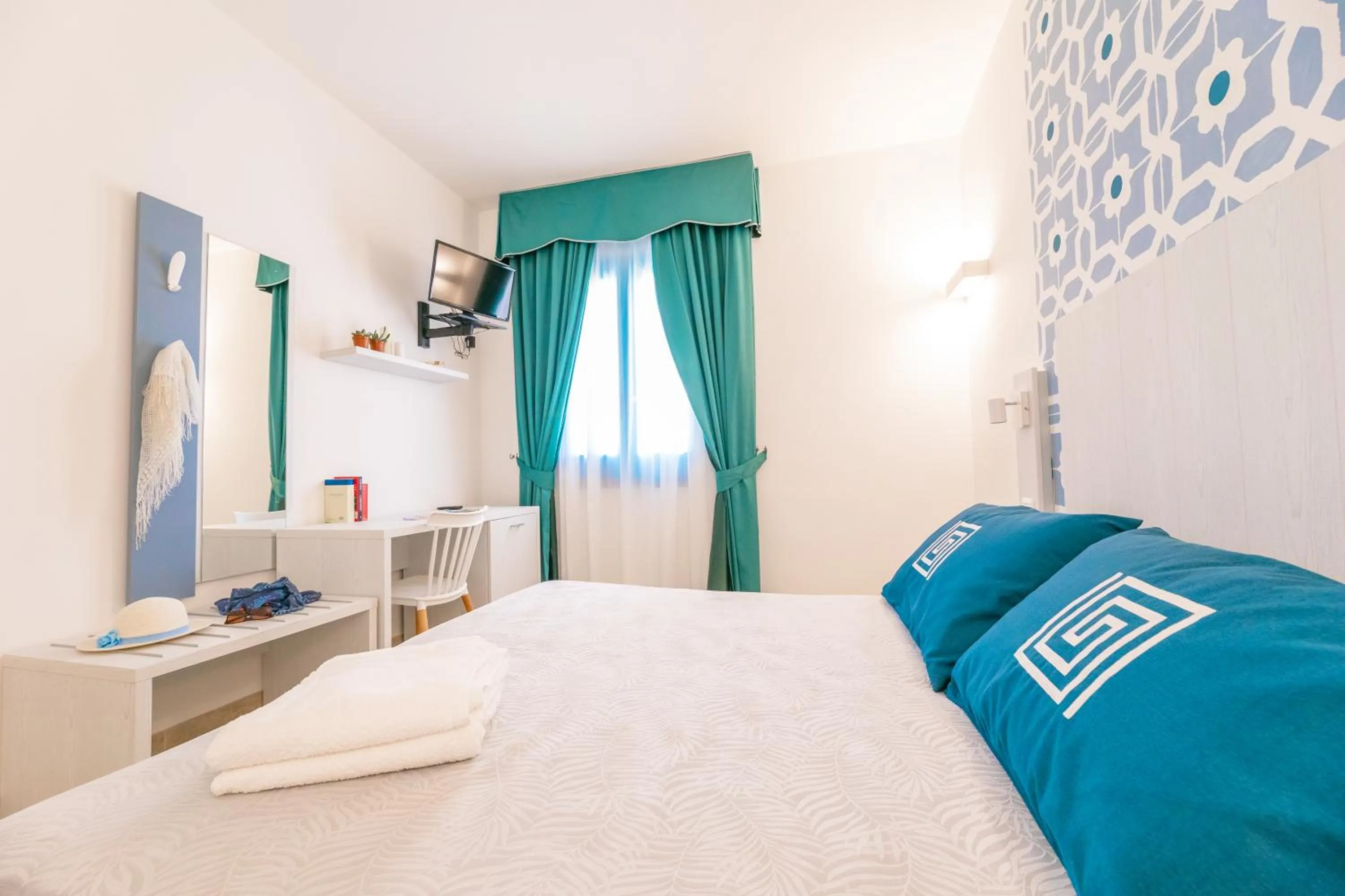 Bed in Hotel Magna Grecia