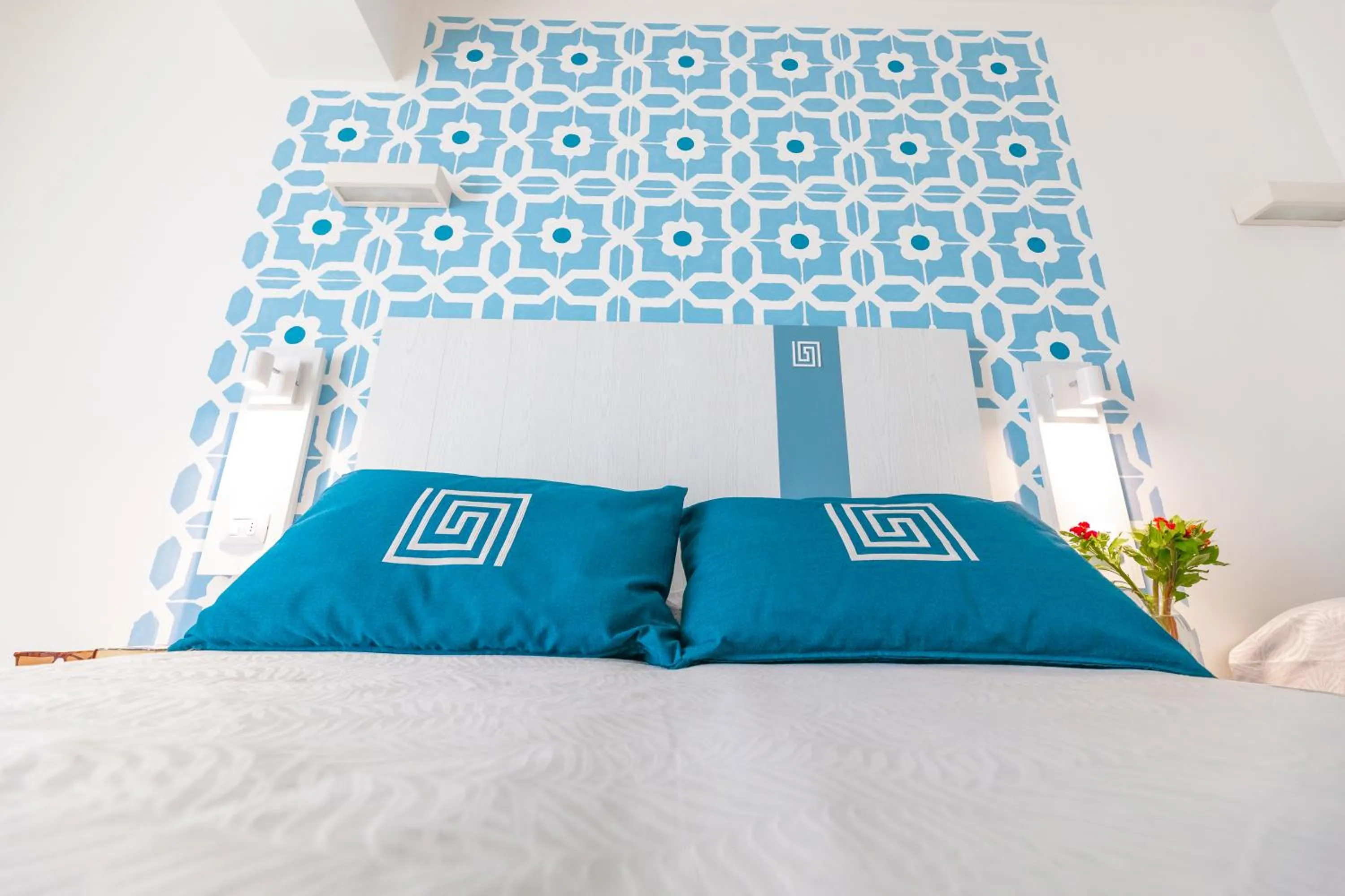 Bed in Hotel Magna Grecia