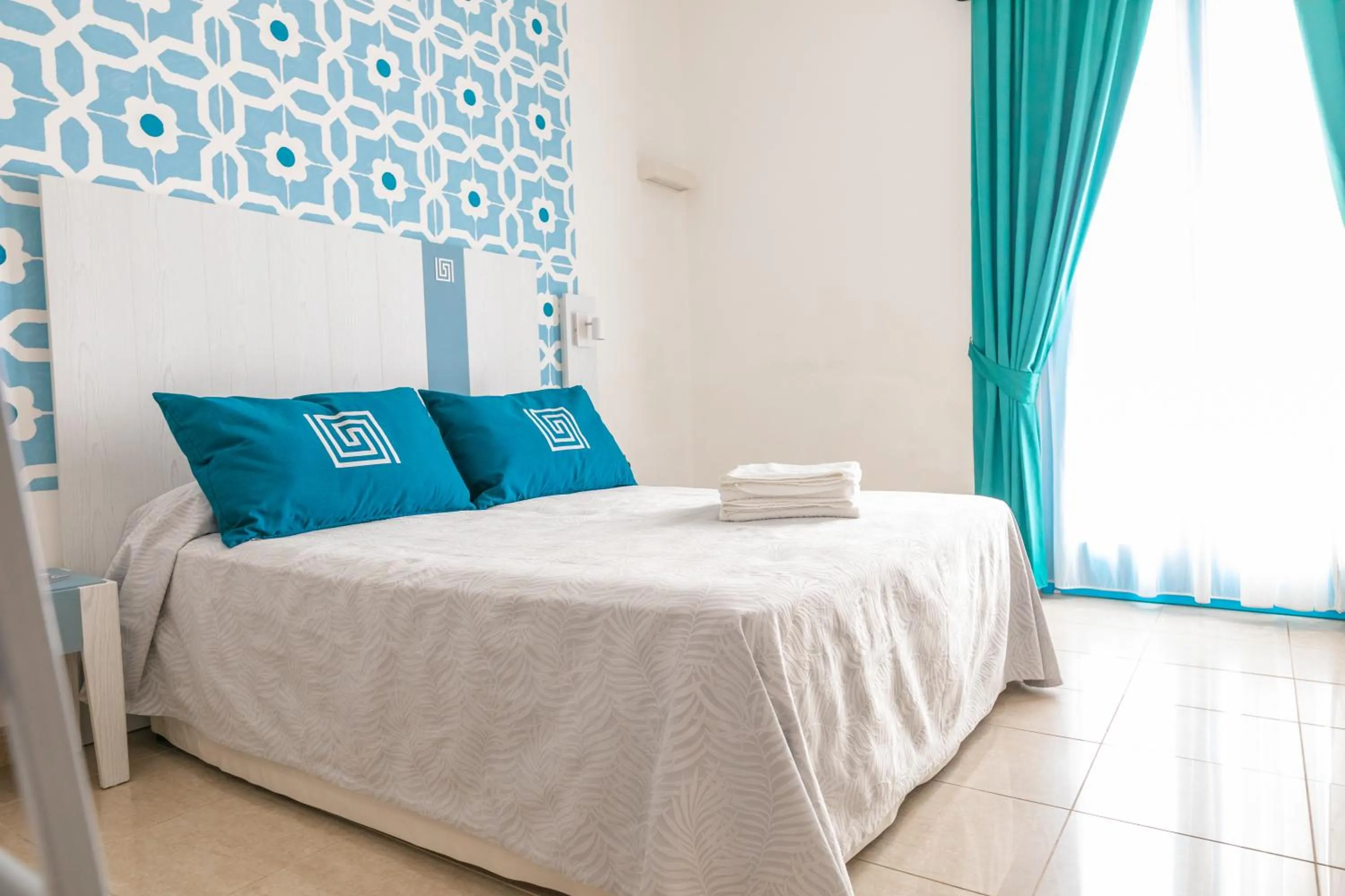 Bed in Hotel Magna Grecia