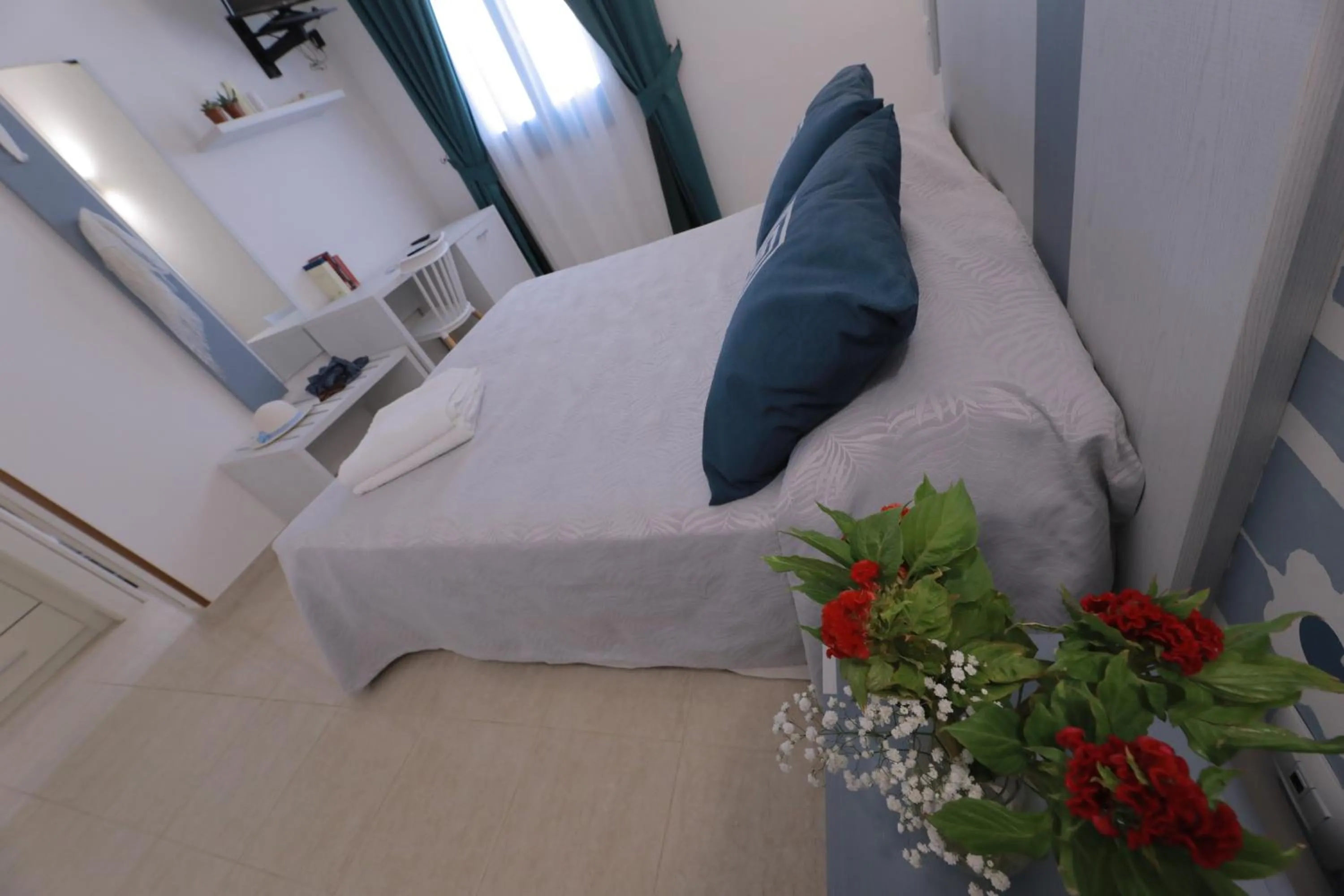 Bed in Hotel Magna Grecia