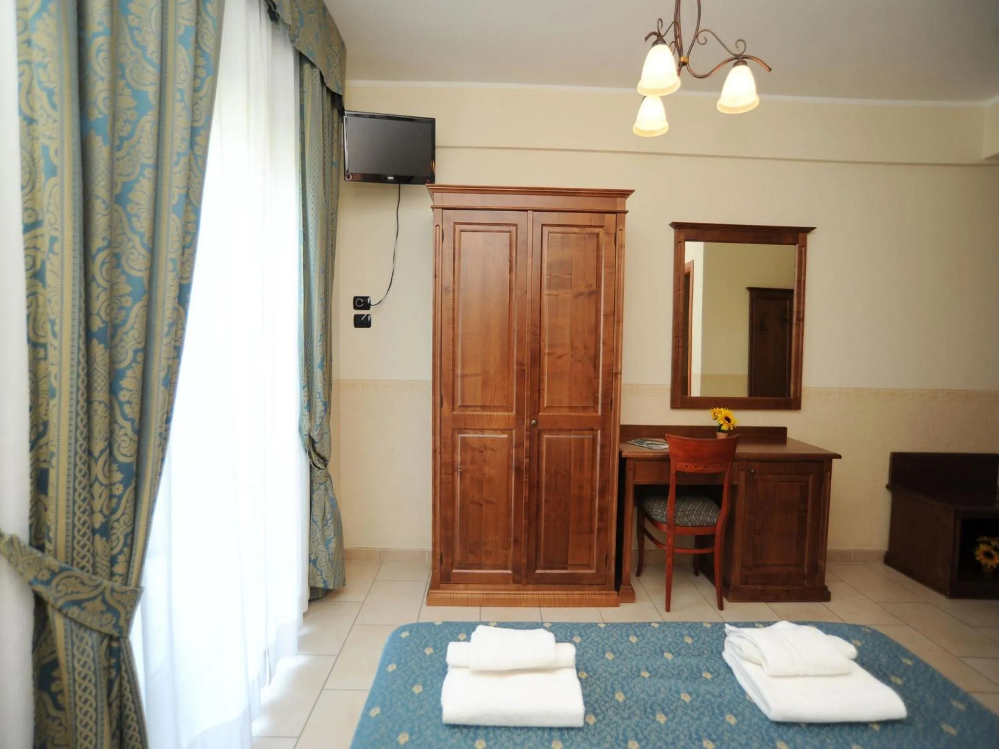 Bed in Hotel Il Melograno