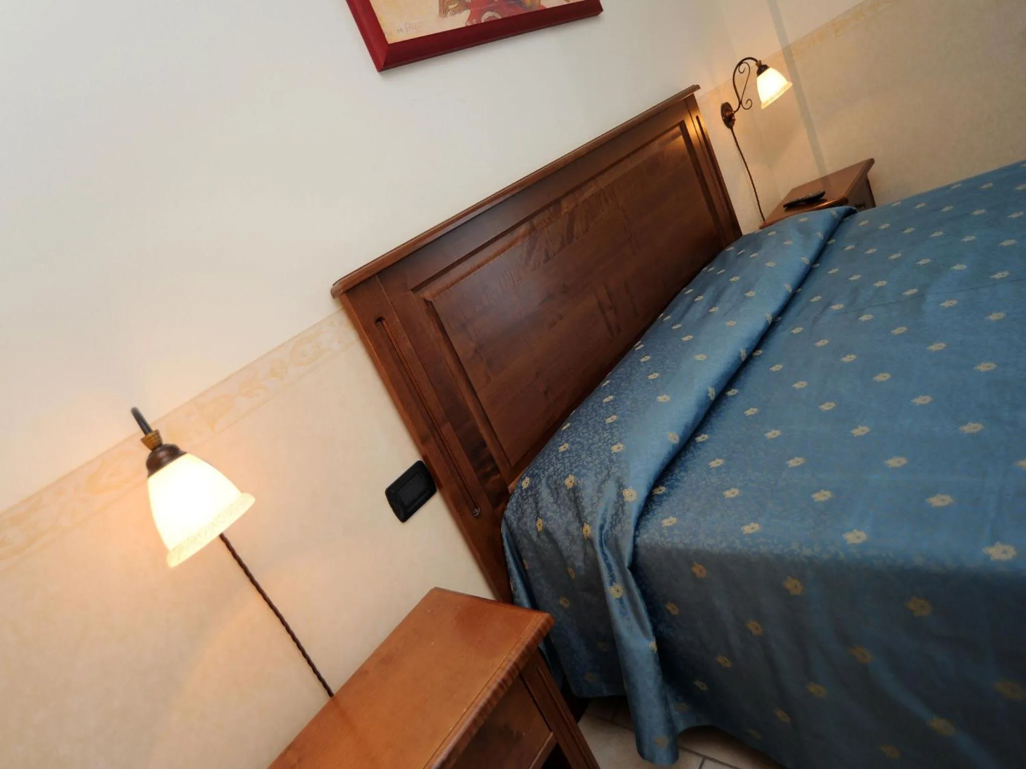 Bed in Hotel Il Melograno