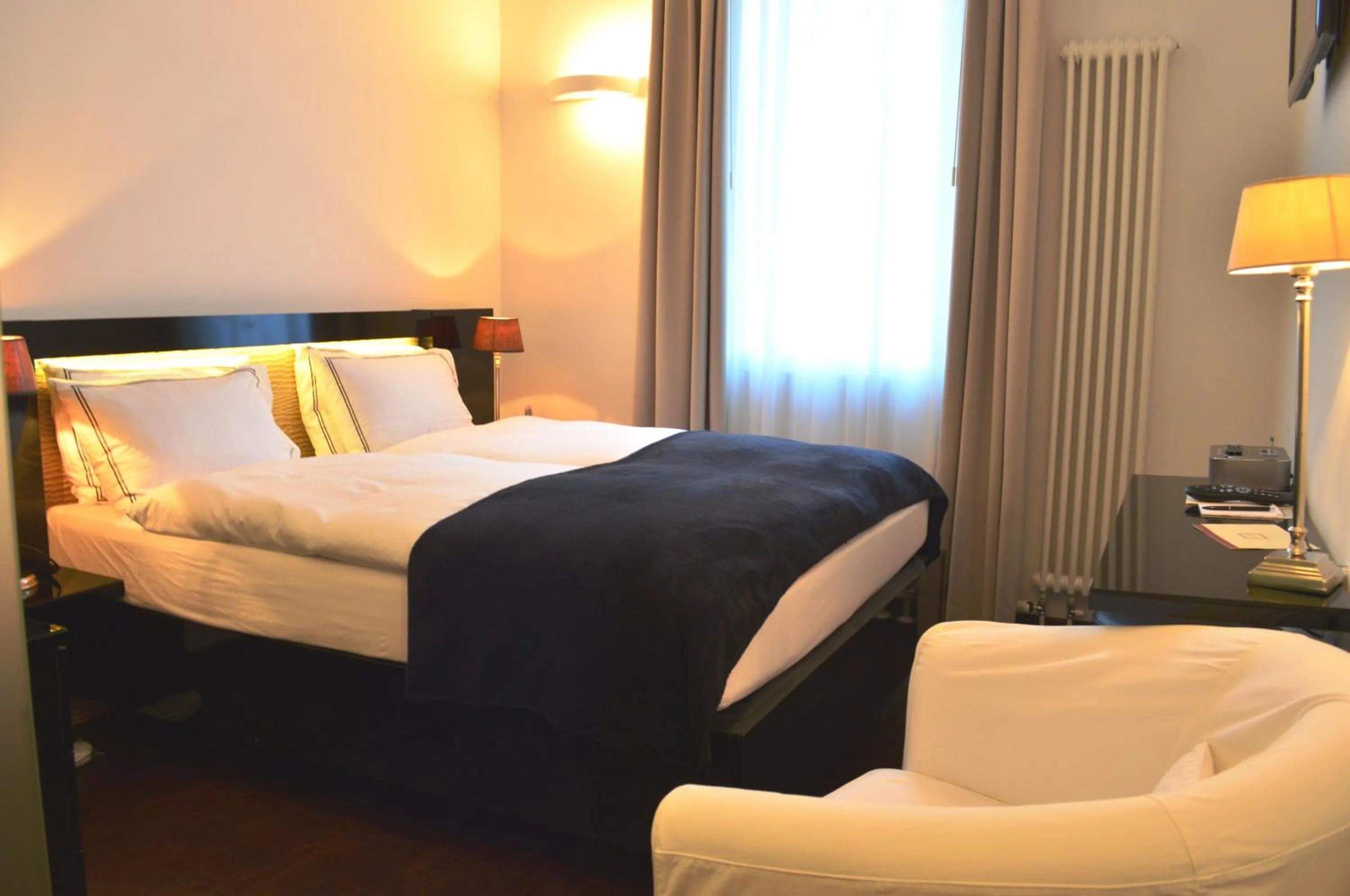 Photo of the whole room in La Rinascente Locarno - Historic Center - Suites & Rooms - Easy Self Check-In