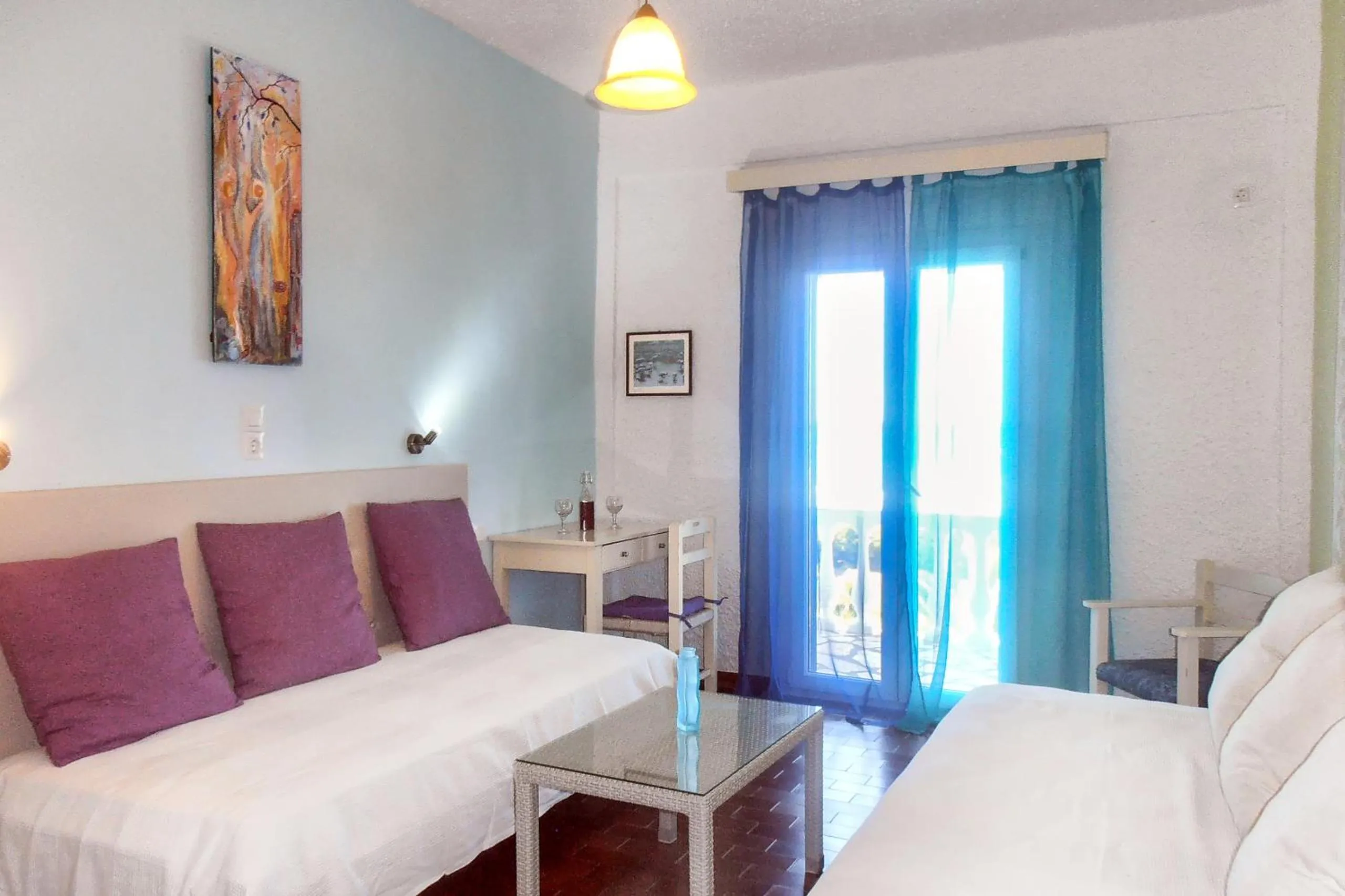 Bed in Elli Beach Apartments and Studios