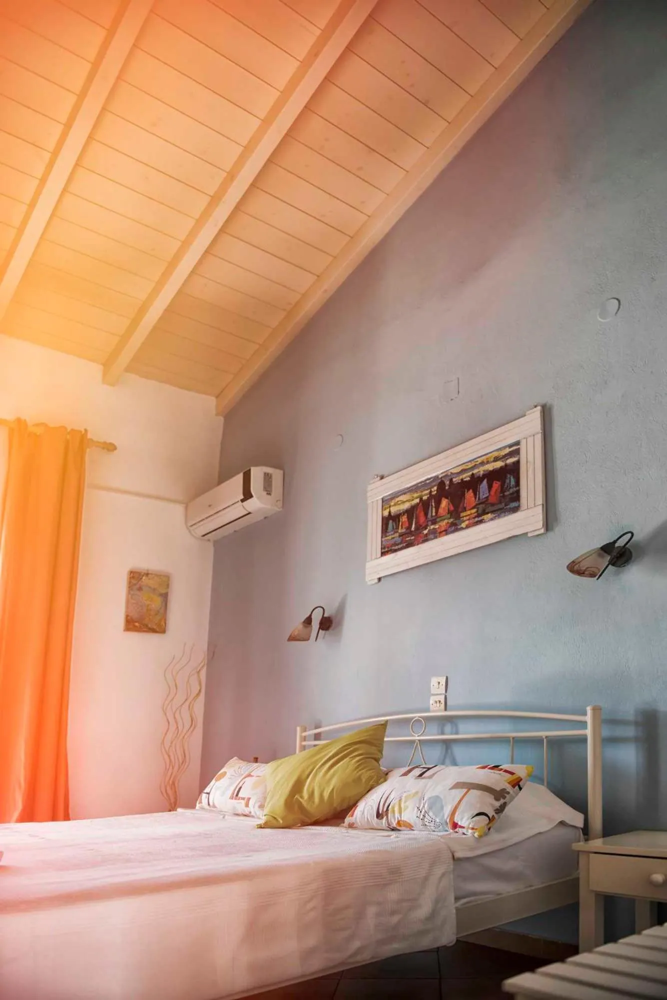 Bed in Elli Beach Apartments and Studios