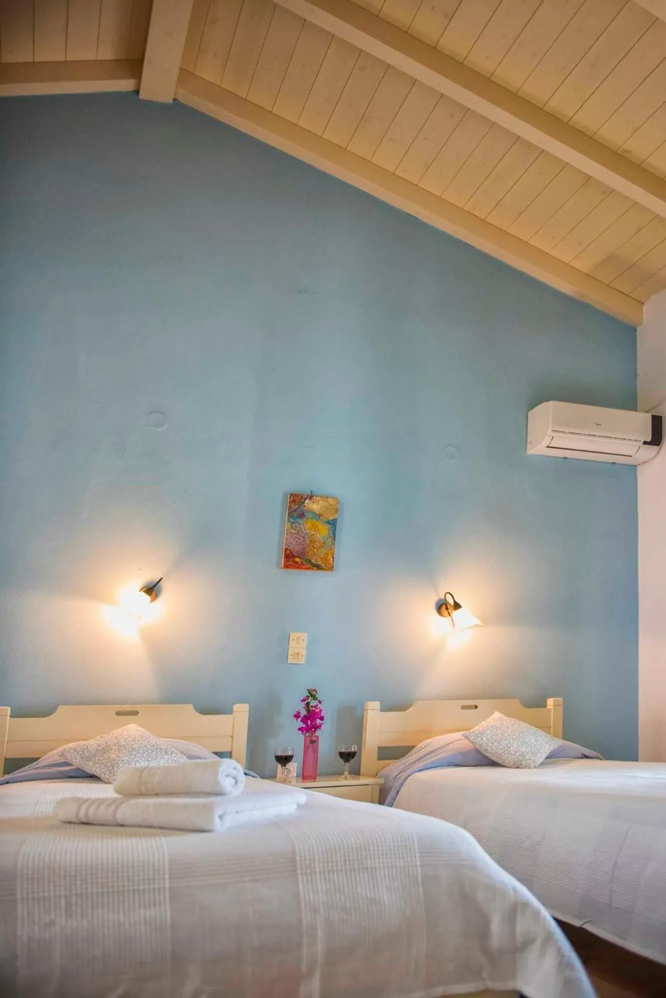 Bed in Elli Beach Apartments and Studios