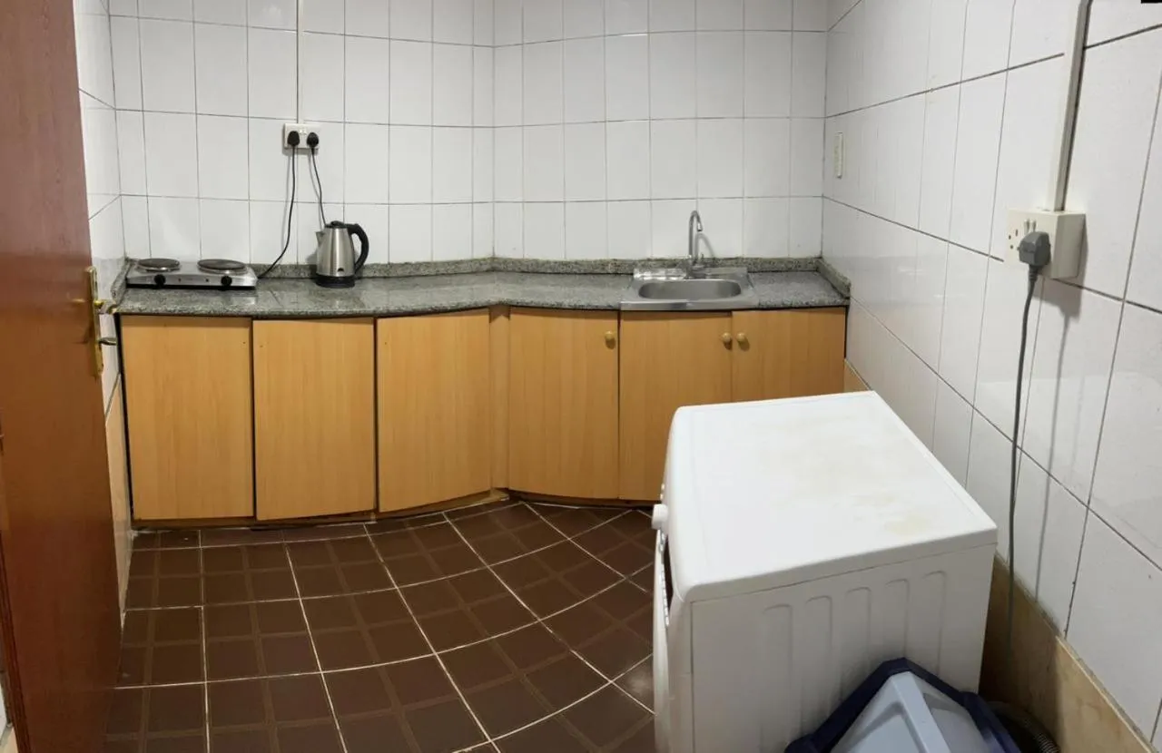 Kitchen or kitchenette in Al Zahabiya Hotel Apartments